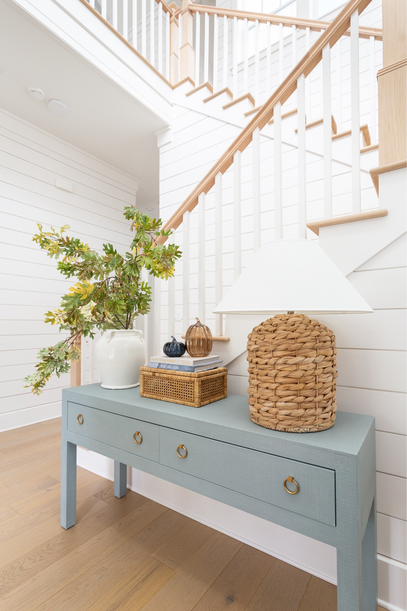 I’m not much of a pumpkin decor girl in the fall, but I love these brown and navy blue glass pumpkins so much! They’re perfect in our fall entryway that also includes a blue linen console table, faux oak leaves, and a seagrass table lamp.
.
#ltkhome #ltkfindsunder50 #ltkseasonal #ltkstyletip #ltksalealert #ltkfindsunder100

#LTKSeasonal #LTKHome #LTKSaleAlert