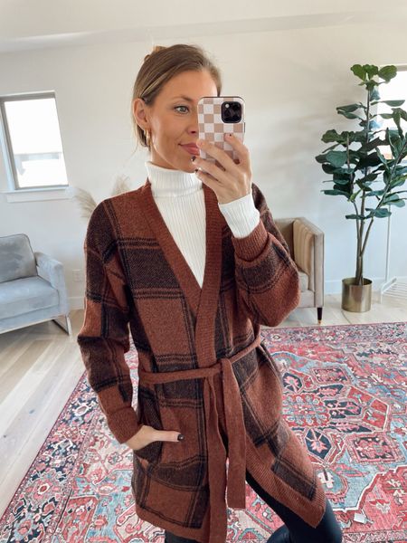 Walmart long cardigan is super soft and cozy! Wearing xs. Plaid cardigan. Black and brown plaid cardigan. Duster cardigan. Teacher outfit. Work appropriate cardigan. Fall outfit. Fall cardigan  


#LTKunder50 #LTKSeasonal #LTKstyletip