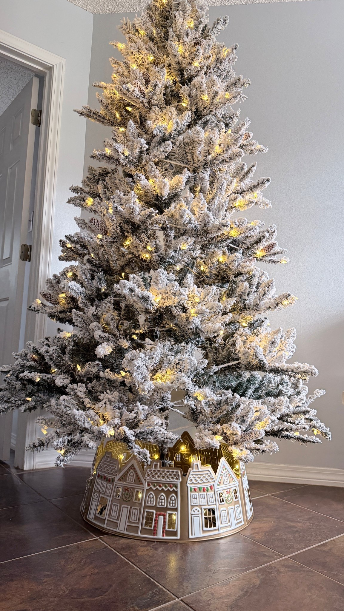 ✨The sweetest tree collar ever! ✨ 
This little gingerbread village lights up and makes the whole tree feel extra magical. Linking it for anyone wanting that cozy Christmas-storybook vibe. 🍬🎄

#LTKSeasonal #LTKHome #LTKHoliday