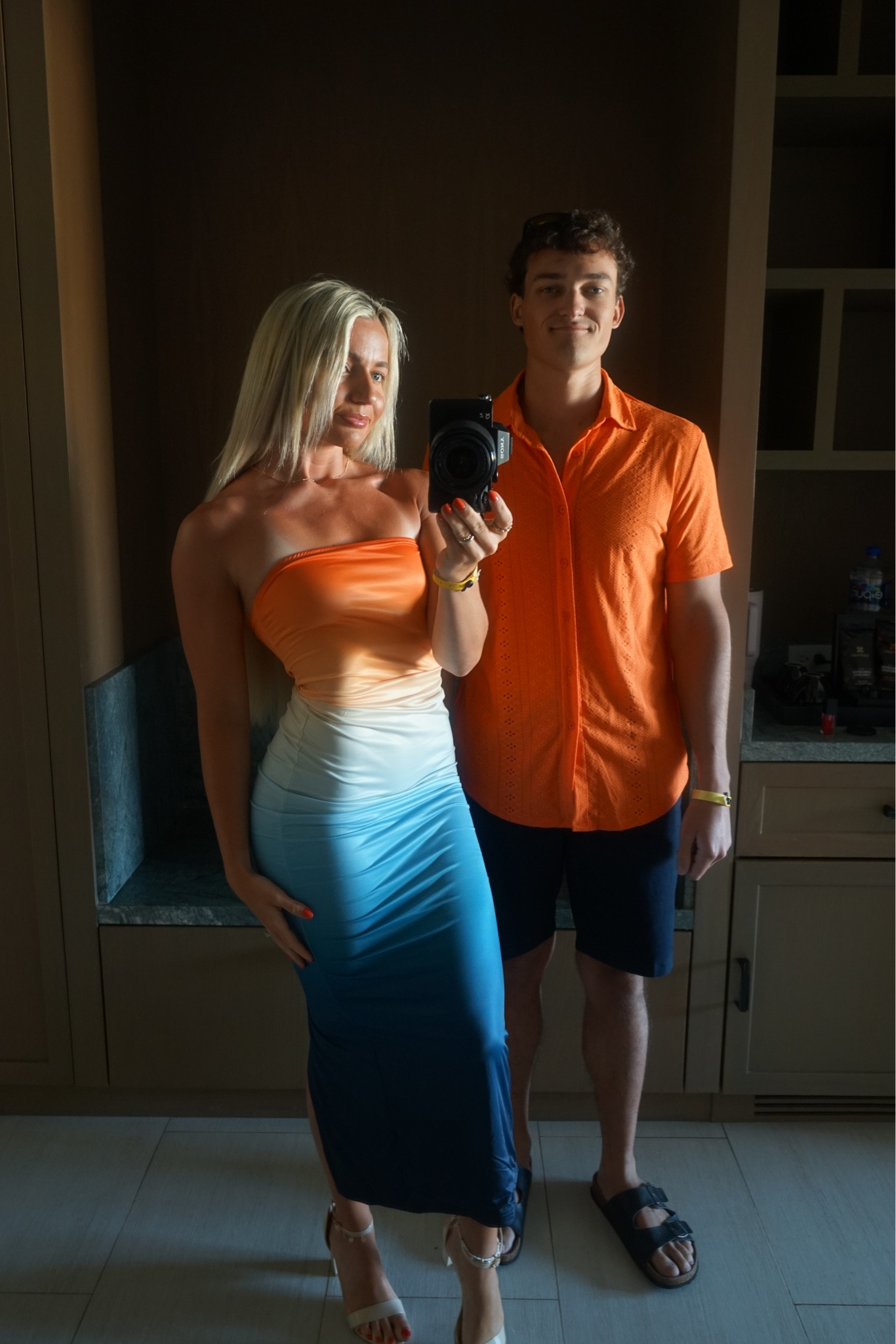 I am wearing a small in the dress and Nick is wearing a medium in the shirt 🌅🌊