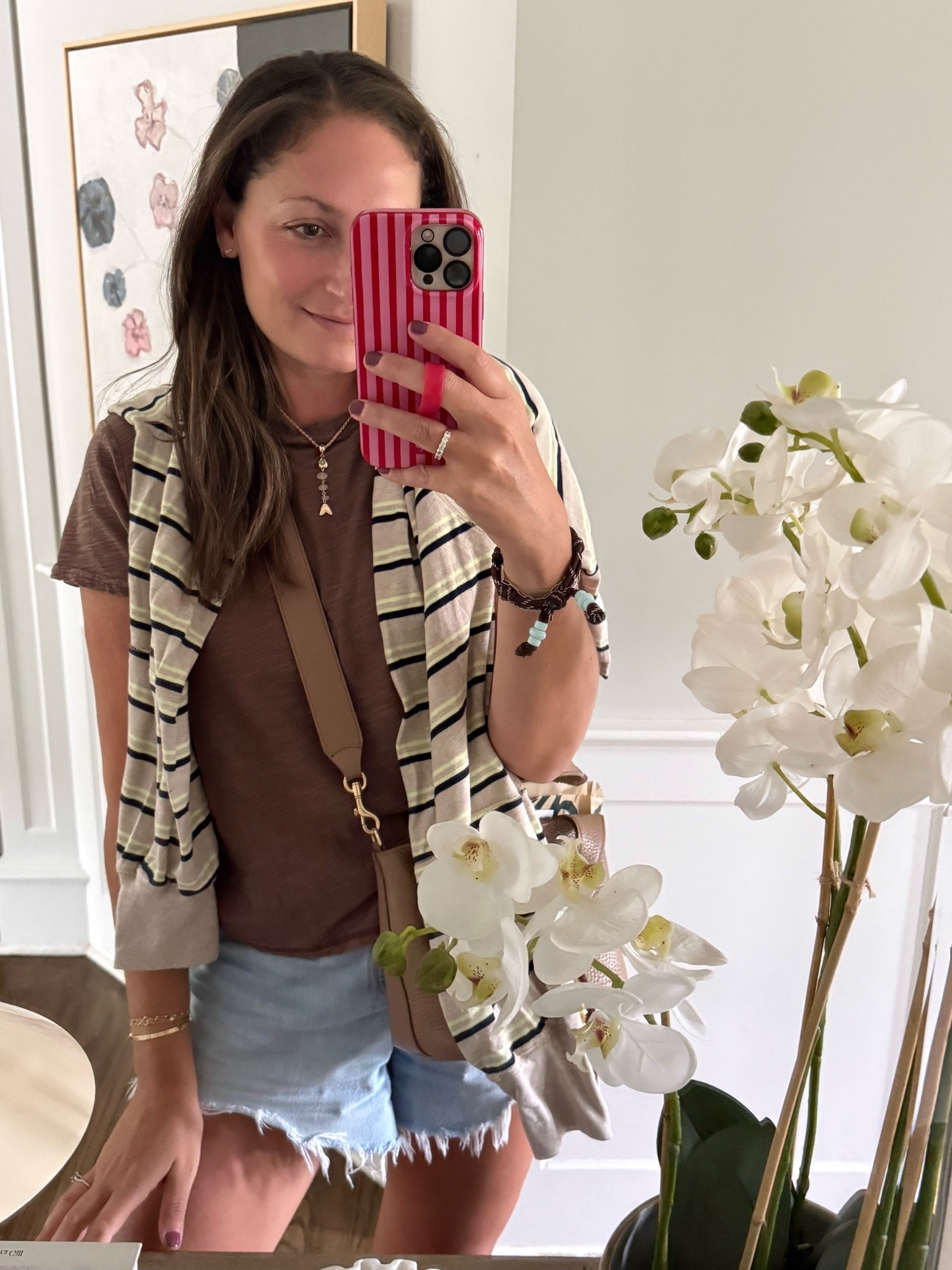 This fall transition outfit is all about easy layers. A simple tee, denim shorts, and a striped sweater draped over the shoulders is such a classic way to bring in fall while the weather is still warm. Finished it with my everyday jewelry and crossbody for an effortless weekend look.

striped sweater, fall transition outfit, summer to fall style, casual fall outfit, denim shorts outfit, everyday wardrobe, layered outfit ideas, neutral fall fashion, weekend outfit, classic style, transitional fashion, girlonthehudson

#LTKStyle #LTKSeasonal