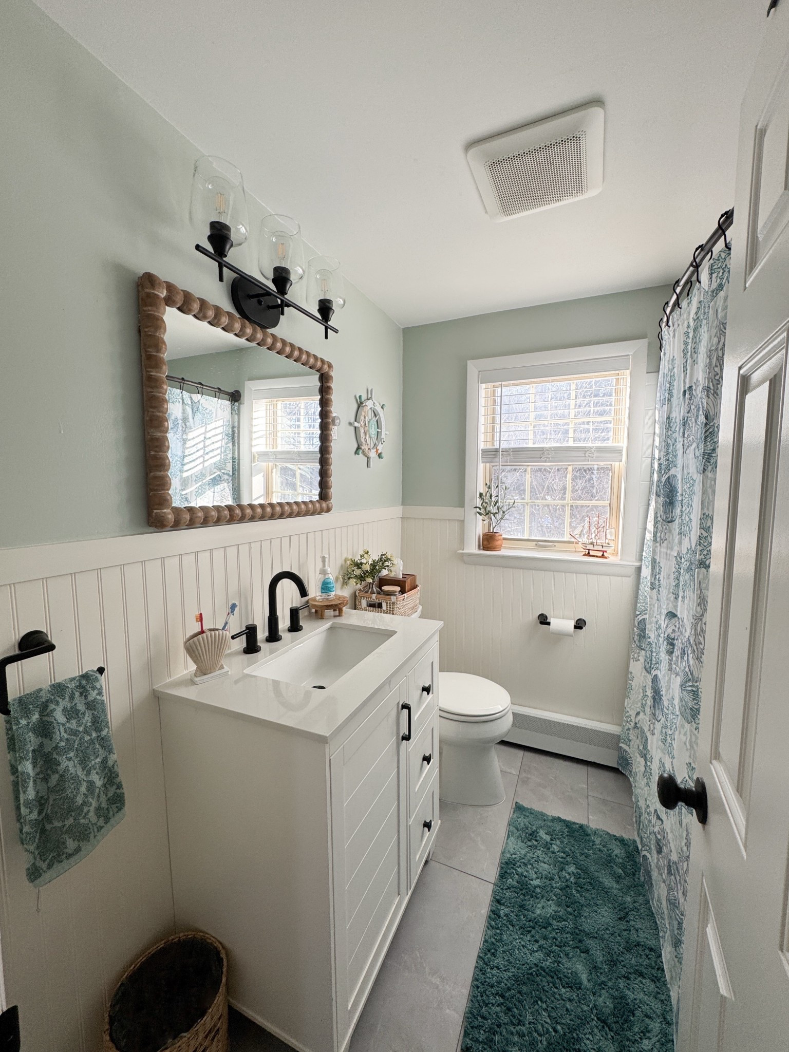 Finally finished!! Our new bathroom decor from our remodel! Love how everything turned out. The wooden beaded mirror and beadboard really finishes the space! I love all the texture. Even linked the bathroom vanity, and bathroom light fixture  

#ltkhome #ltkseasonal #ltksalealert

#LTKFindsUnder50 #LTKFindsUnder100