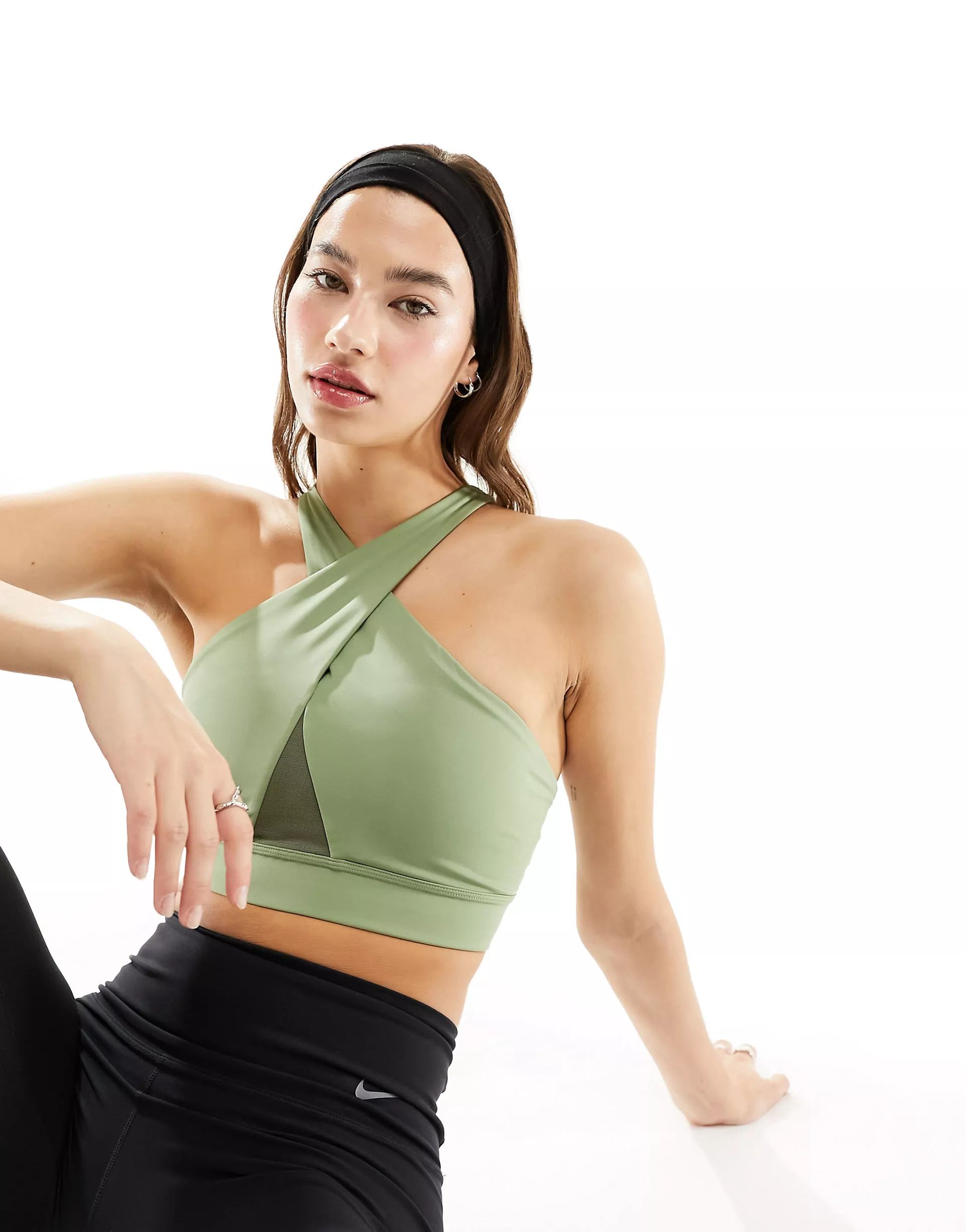 Nike Dri-FIT Road To Wellness Swoosh wrap sports bra in green | ASOS (Global)