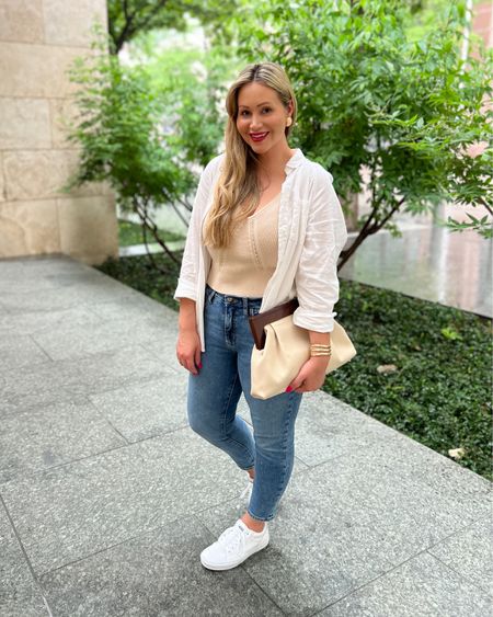 Summer casual outfit: white linen shirt (similar linked), cropped sweater tank (M), extra stretch jeans (10), white leather fashion sneakers (men’s 8), hammered cuff and textured gold earrings 

#LTKFind #LTKstyletip #LTKSeasonal