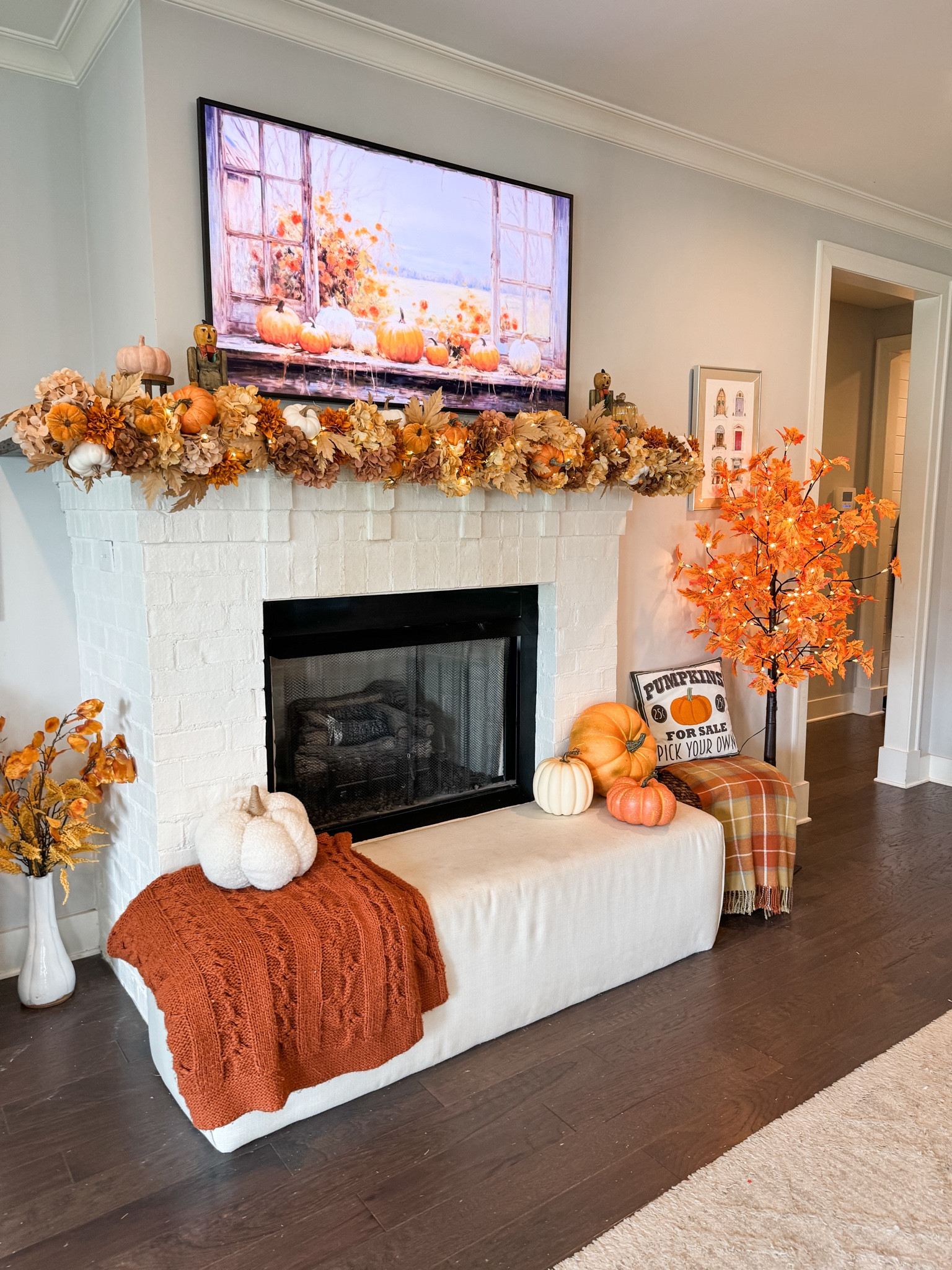 Fall mantel! 🎃🍁🍂 I love how our fall mantel turned out!! You can use a pool noodle and some fall floral picks to create a gorgeous full garland! #fall #fallmantel #falldecor #falldecorations 

#LTKSeasonal #LTKVideo #LTKHome