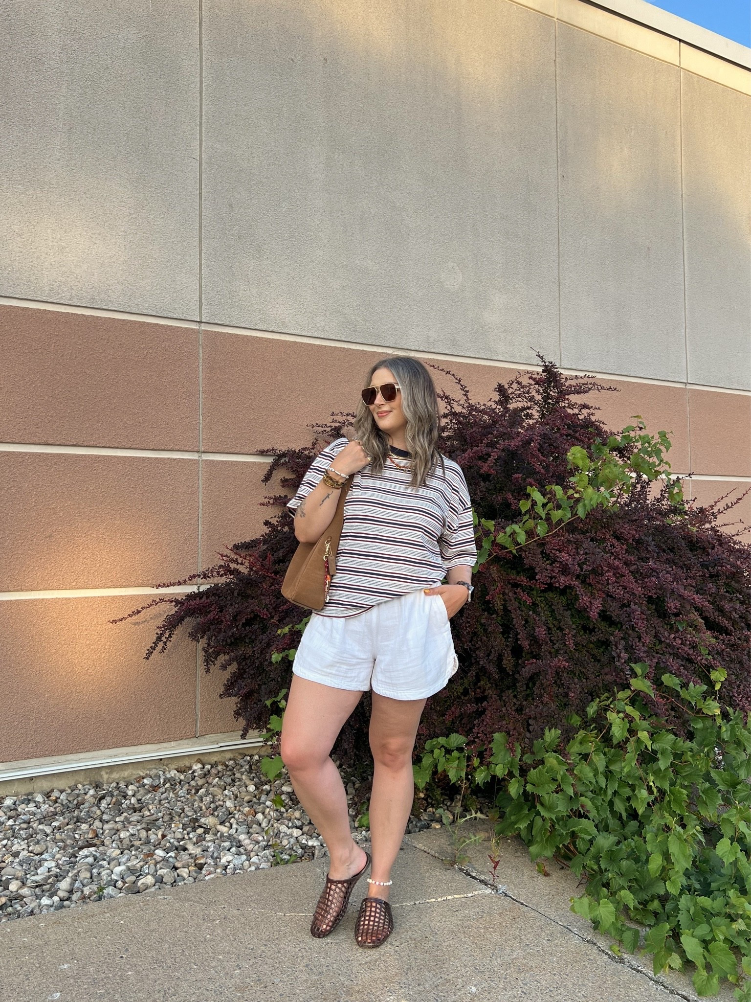 Simple summer outfit! Wearing L in the striped tee. Shorts are old, linked similar. I’m a 9.5-10 shoe and wear a 10 in the jelly shoes (Canadian link under “similar products”). Also linked other jelly options!

#LTKsummer #LTKsale #LTKmidsize