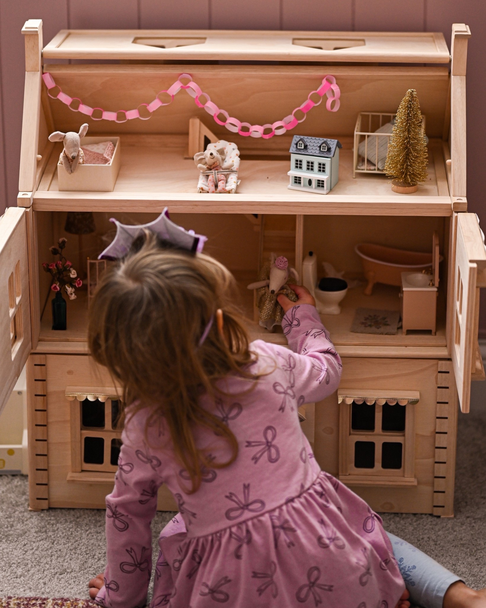 This is my daughter’s wooden dollhouse that we use for Maileg mice.  have the older 3 story version, but a new larger version of the dollhouse is available with a 4th floor that I linked below, as well.

Kids rooms, mouse house, Maileg, dollhouse decor

#LTKHome #LTKKids #LTKHoliday