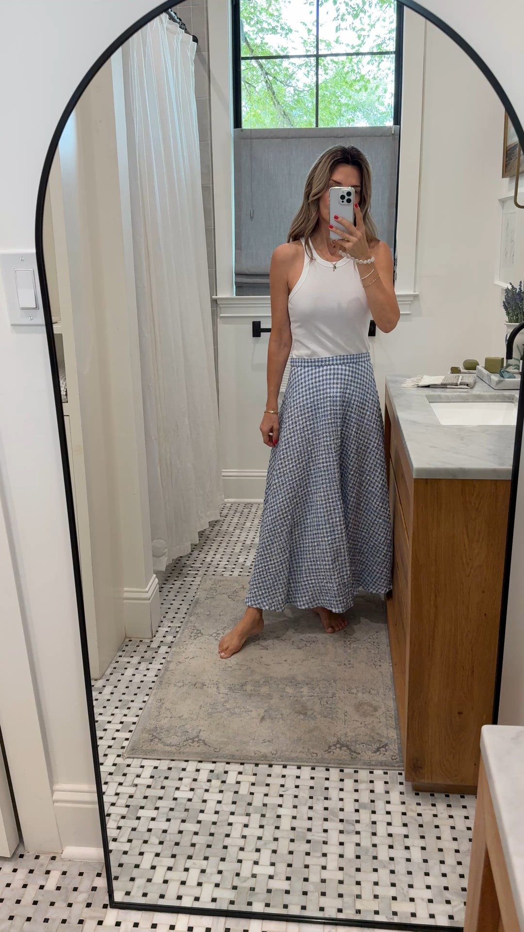 -Zara skirt XS. Size down  
-white Toteme tank 

#LTKTravel #LTKOver40