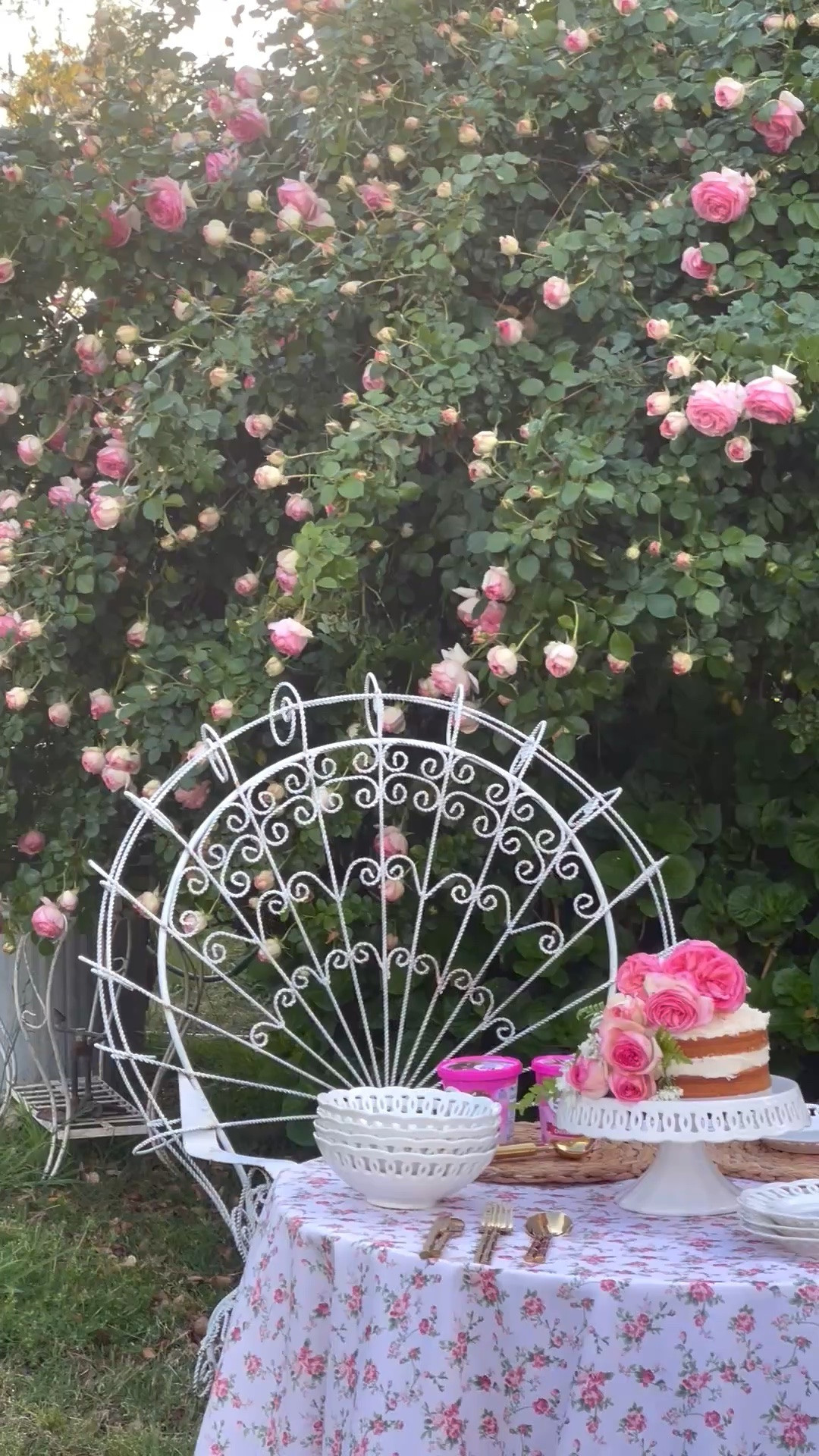 Beautiful spring tablescape with a floral print tablecloth, a delicious cake on a white cake stand, gorgeous pink roses on a trellis and classic dinnerware. 💗

#LTKSeasonal #LTKHome #LTKdayinmylife