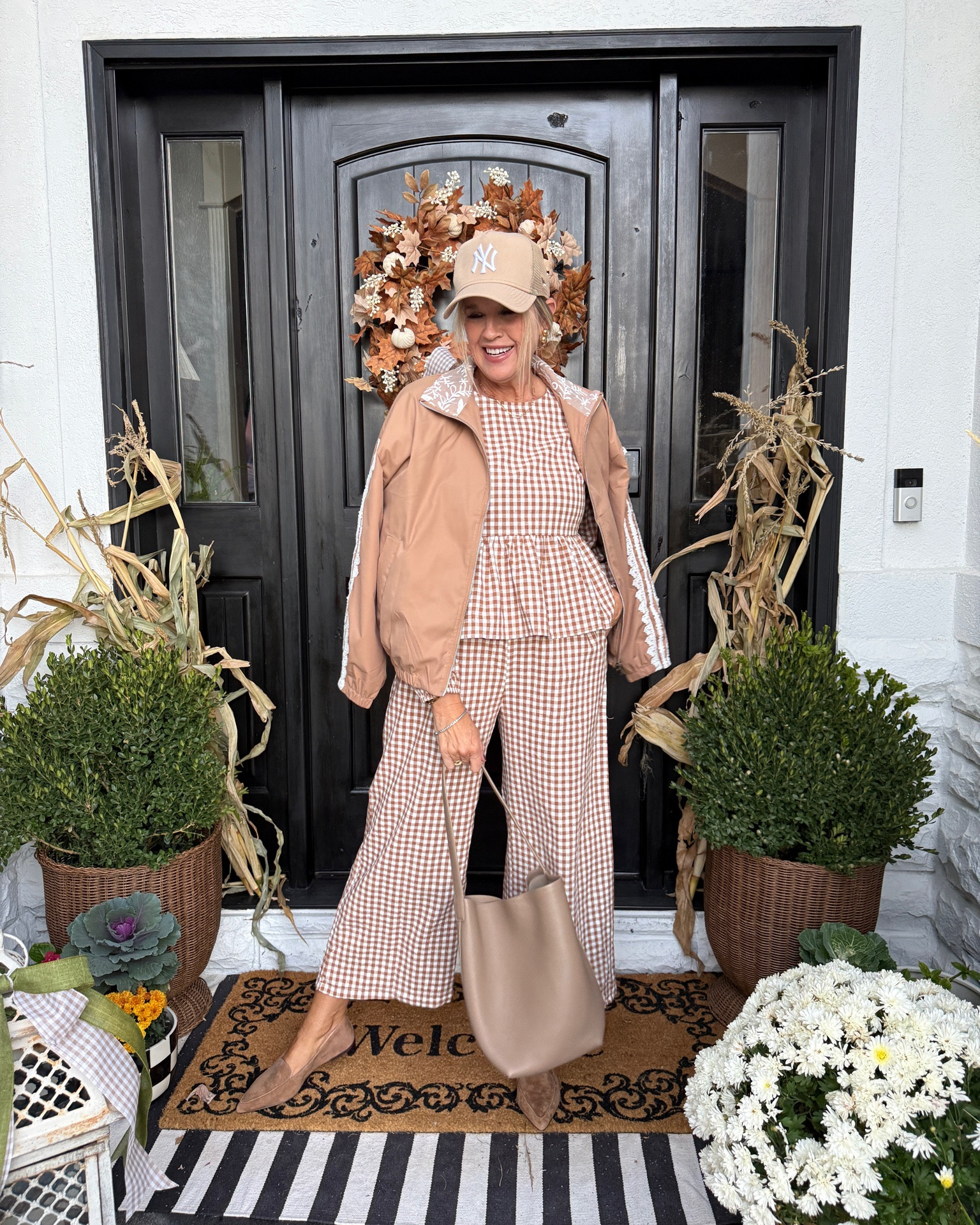 Happy Sunday from our home to yours🍂❤️🙏

🍂🍁Fall Front Porch and a little gingham outfit set!

Fall wreath I made❤️🍁🍂
A collection of Pumpkins, mums, cabbage, kale, corn stock and boxwoods.

 Outfit details and some of my planter pots, ribbon and decor