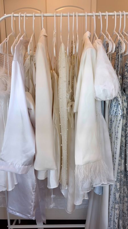 My minimoon & honeymoon bridal wardrobe! Many of these outfits are perfect for a bachelorette, bridal shower, engagement party etc. 
🤍💍👰🏼‍♀️🥂

White feather slip dress: Nasty Gal
Baby’s breath slip dress: Victorias Secret (For Love & Lemons collab)
Custom embroidered bride robe: Etsy
Bow top & skirt: White Fox
Ivory blazer and dress shorts: Forever 21
Rose halter mini dress: Meskhi
Beaded/pearl long sleeve and mini skirt: Oh Polly
White slip dress: Altar’d State
White slip dress with rhinestone straps and bows: Sisters The Label
Puff sleeve glove dress: For Love and Lemons
Feather mini blazer and skirt: Honey
Puff sleeve corset dress: Adeirlina
Baby blue silk halter dress: Altar’d State
Satin cowl neck slip dress: Abercrombie
White and blue floral maxi dress: LC Lauren Conrad
White and blue floral maxi dress: American Eagle
White and blue paisley maxi dress: American Eagle
Rhinestone/pearl mesh cover up: Lulus 
White linen tie up top and skirt: Target
Wide leg linen pants and long sleeve top: Abercrombie
White Puff sleeve bubble dress: Free People
Custom bride denim Jacket: Wedding Favourites or Etsy

#LTKSeasonal #LTKunder100 #LTKwedding