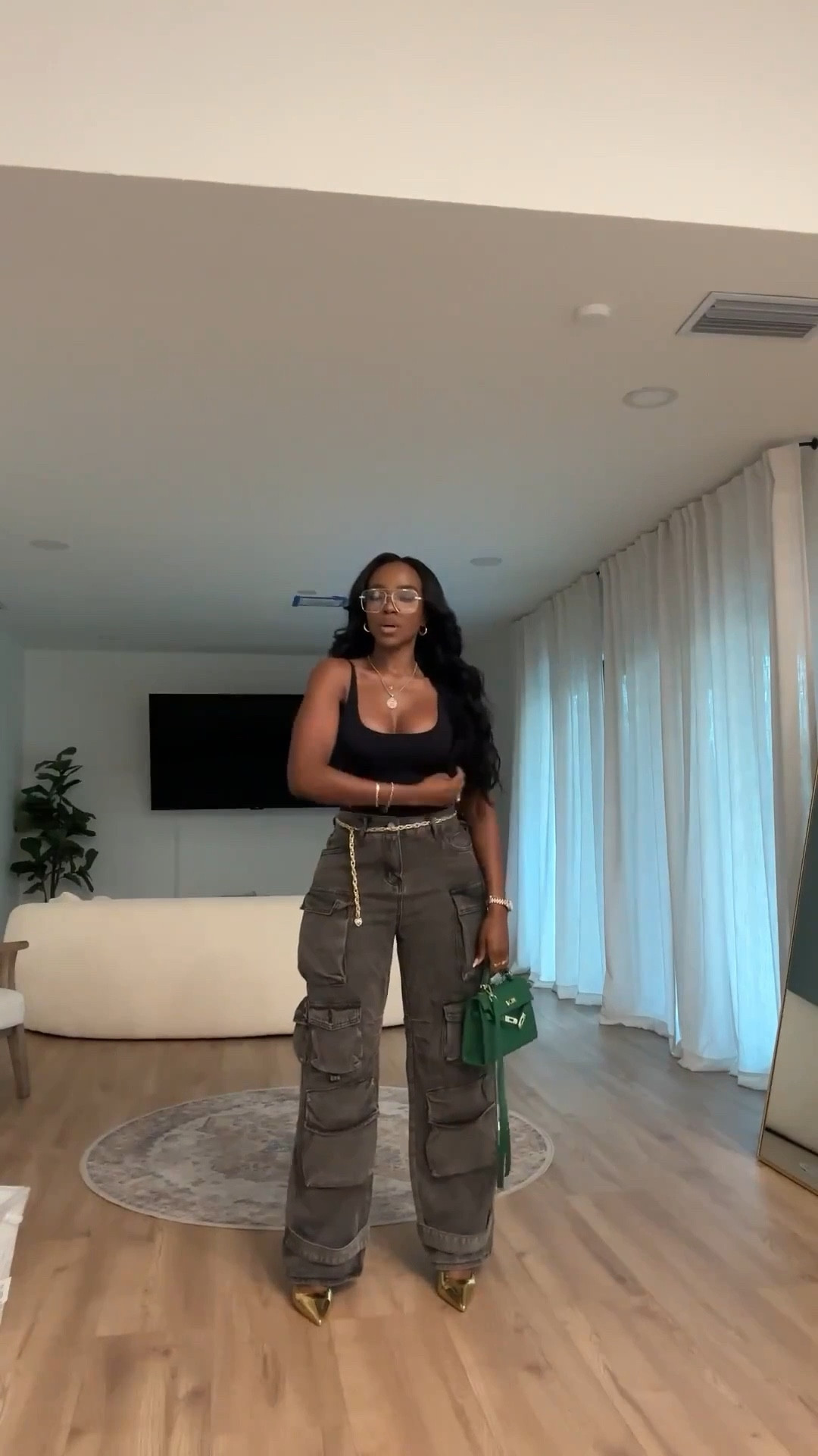 ✨ Chic Utility, Elevated for Everyday

Wide-leg cargo pants are having a moment, and this pair delivers that designer-inspired feel without the designer price. Styled with a fitted black top and a subtle pop of green, this look balances structure and ease for an off-duty outfit that still feels polished. Relaxed, functional, and endlessly rewearable — exactly the kind of staple that works overtime in your closet.

Perfect for:
• Casual days
• Errands
• Laid-back weekend plans
• Everyday elevated style

📏 Sizing:
Top — Small
Pants — 27 Long

Measurements:
5’4” · 138 lbs · 34D · 27” waist · 40” hips

Tap to get details.

Wide-leg cargo pants outfit, chic utility style, elevated off-duty looks, designer-inspired fashion for less, everyday neutral outfits, versatile wardrobe staples.

Follow me on Instagram and YouTube @kirasfashionfinds

