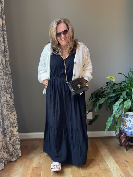 Trying a new styling tip I saw on insta. Black dress and oversized white cardigan. Elevated bag. 

Size L in dress and sweater. Both run big. Code NANETTE10 for 10% off Gibson order 

Linking similar purse and earrings  

#LTKitbag #LTKunder100 #LTKSeasonal