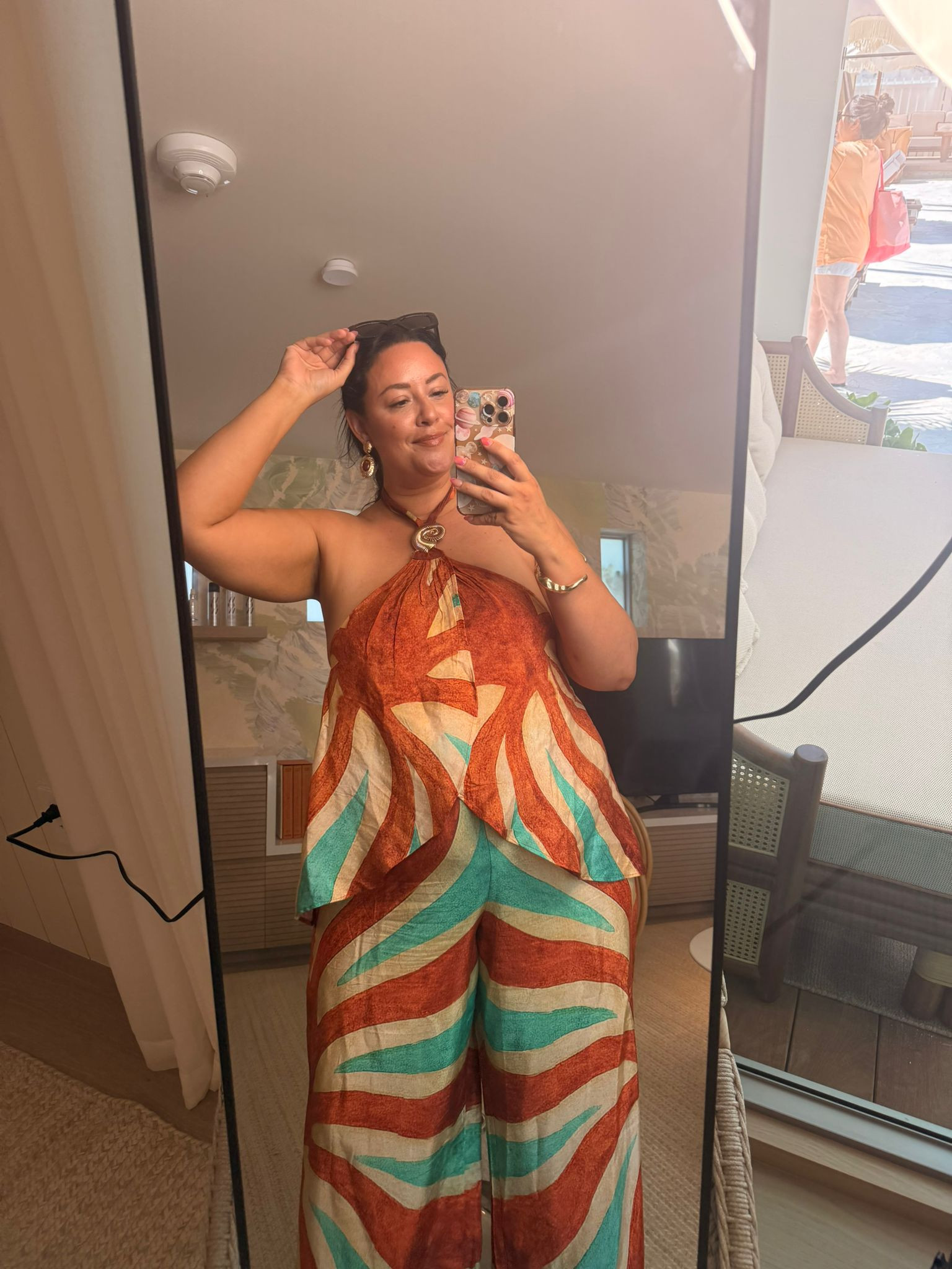 rust halter top, printed matching set, wide leg pants, resort outfit, vacation style, tropical getaway, statement necklace, bold earrings, mirror selfie, warm tones, turquoise print, summer look, effortless style, beach resort, chic vacation fashion 

 #LTKspring #LTKsummer #LTKeurope