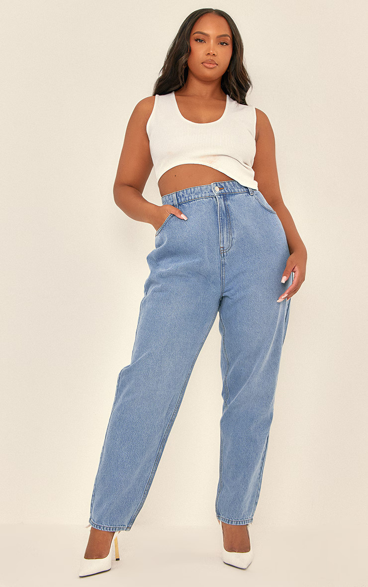 PRETTYLITTLETHING Plus Mid Blue Wash High Rise Mom Jeans | PrettyLittleThing US