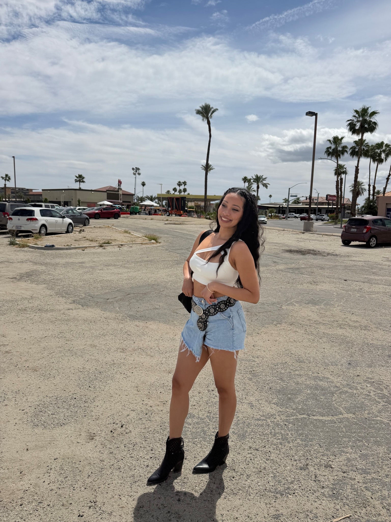 Coachella Weekend 1 | Sabrina Carpenter Pop-Up ⛽️💖 White one shoulder cross crop top + denim skort + cowboy booties for the desert heat and dust 

#LTKFestival #LTKootd #LTKdayinmylife