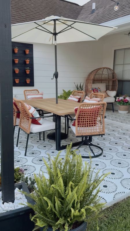 Our outdoor patio refresh! 💃🏻 Outdoor decor, home decor, patio decor, outdoor furniture, planters, faux plants, stenciled concrete, outdoor dining table, egg chair, bistro table and chairs set

#LTKHome #LTKFamily #LTKVideo