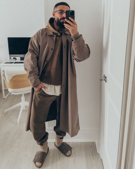 SALE 🚨sweatpants on sale up to 25% off… FEAR OF GOD Hoodie in ‘Vintage Mocha’ (size M), Allstars Henley tee in ‘Vintage White’ (size M) and M7th Collection Socks in ‘Beige’. ESSENTIALS Long Coat in ‘Wood’ (size M) and Sweatpants in ‘Wood’ (size M). FEAR OF GOD x BIRKENSTOCK Los Feliz sandals in ‘Ash’ (size 41). FEAR OF GOD x BARTON PERREIRA glasses in ‘Matte Khaki’. A relaxed and elevated men’s look that’s cozy and layered for a day or night out. 

#LTKsalealert #LTKstyletip #LTKmens
