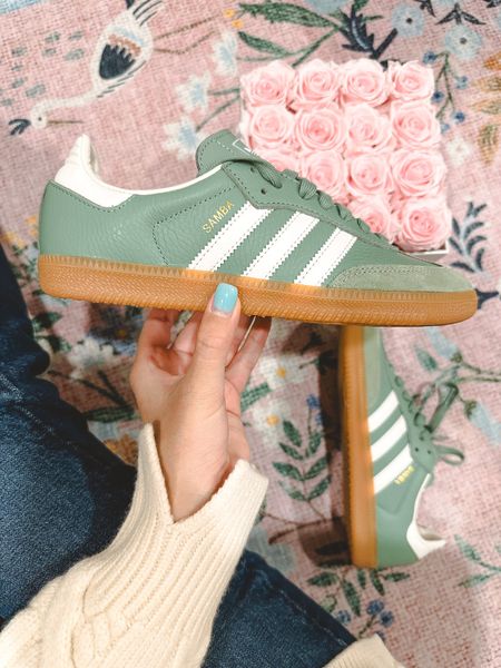 Adidas samba sneakers in olive are perfect for spring! I wear a 7.5 and sized down to a 7

#LTKSeasonal #LTKfindsunder100 #LTKshoecrush