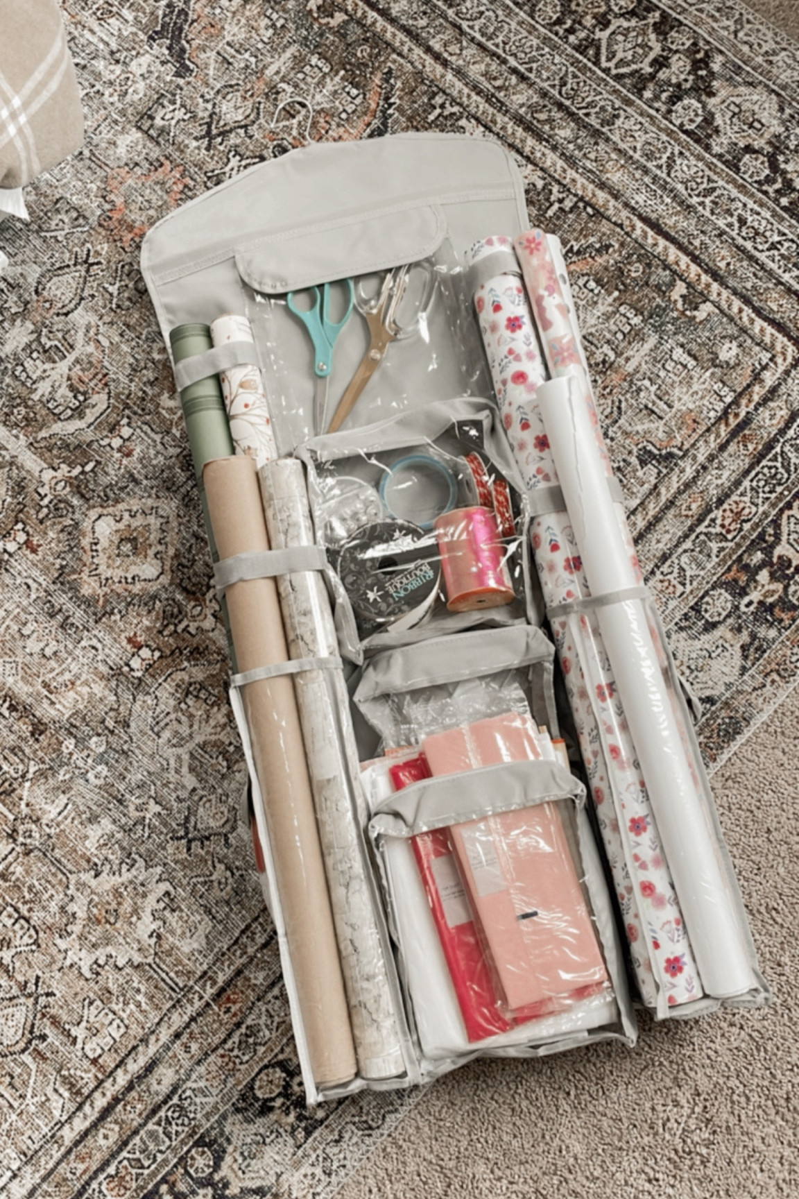 Double sided hanging wrapping paper organizer, gift wrap organizer, amazon organizing products, gold and acrylic scissors

#LTKhome #LTKFind #LTKSeasonal