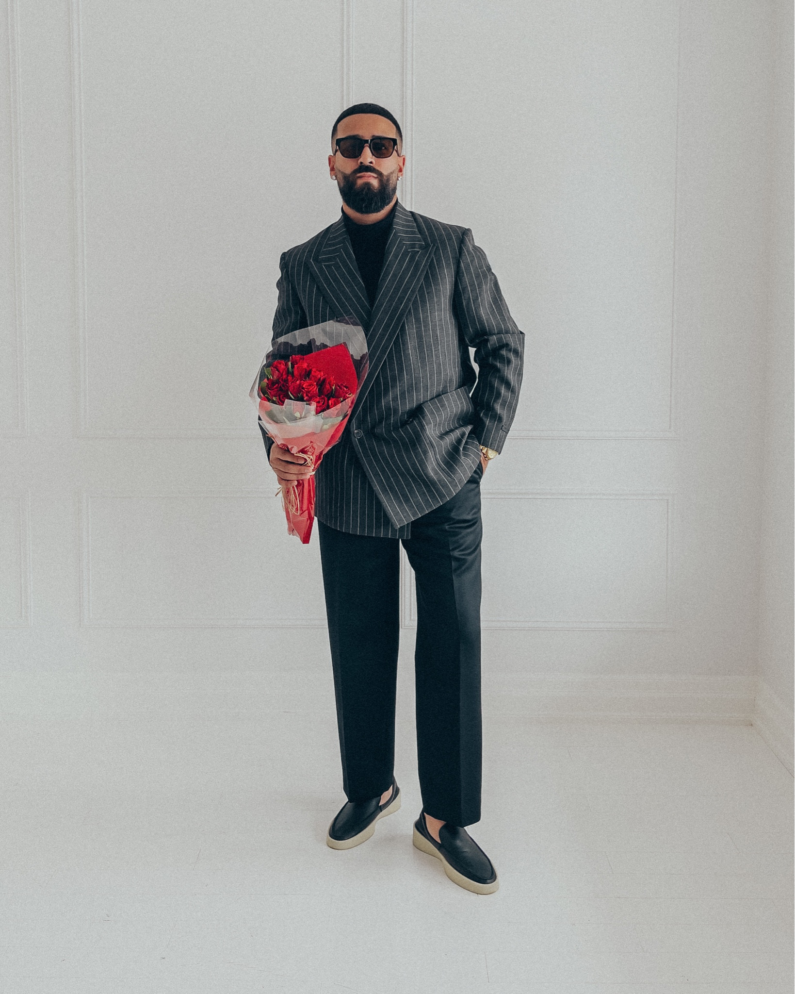 FEAR OF GOD Pinstripe Blazer in ‘Charcoal/Black’ (size 48), Turtleneck Long Sleeve shirt in ‘Black’ (size M), Double-Pleated Trousers in ‘Black’ (size 48), and The Loafer in ‘black leather’ (size 41). FEAR OF GOD x GREY ANT glasses. A relaxed and elevated men’s look that’s perfect for a date night out or a day at the office. Pieces from this look are currently on sale up to 60% off in limited quantities. 

#LTKmens #LTKsalealert #LTKstyletip