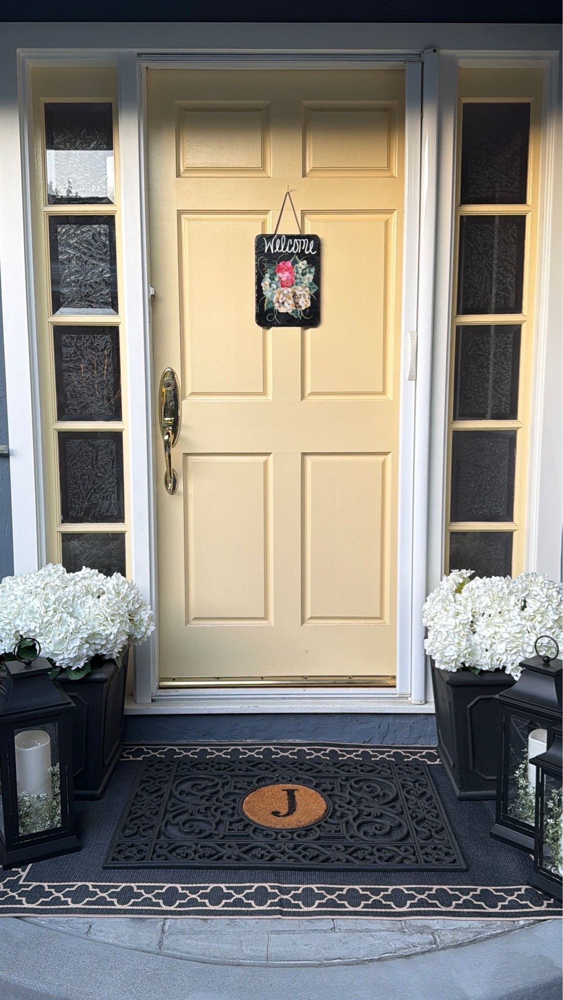 I finally added an outdoor rug underneath my front door mat! It gave the front porch a finished look! 

With my fluffy faux hydrangeas and my lanterns, my porch is completely for a spring look!

#LTKHome #LTKSeasonal