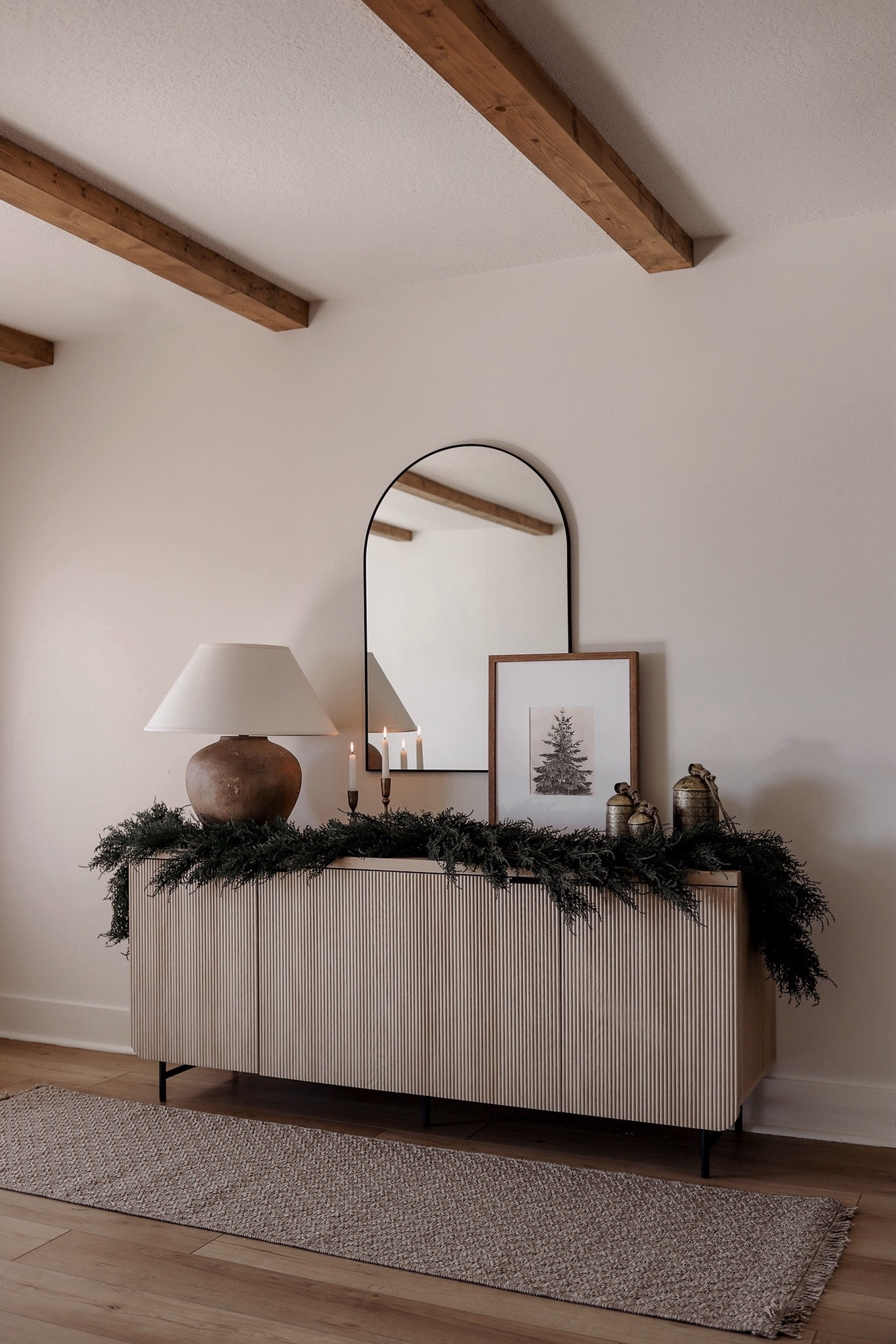 A holiday sideboard moment ✨ Layered with greenery, warm wood tones, and simple seasonal accents to make everyday spaces feel festive without feeling overdone. Everything linked below! 

#LTKHoliday #LTKHome #LTKSeasonal