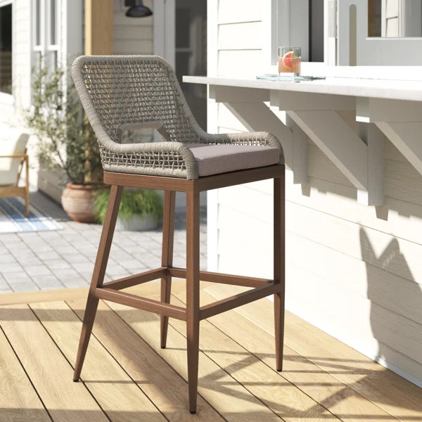 Lesley Patio Metal Frame Bar Stool with Cushion | Wayfair North America