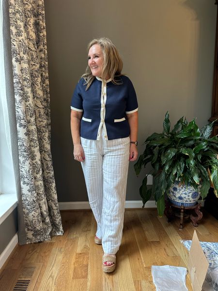 This sweater is full bodied. Not lightweight. Great for the office. Navy is soldout. Grey or cream available. I’m
Wearing a large. 

100% linen in pinstripe. Size 12 reg. A little snug when I put them on. They relaxed  

#LTKmidsize #LTKover40 #LTKfindsunder100