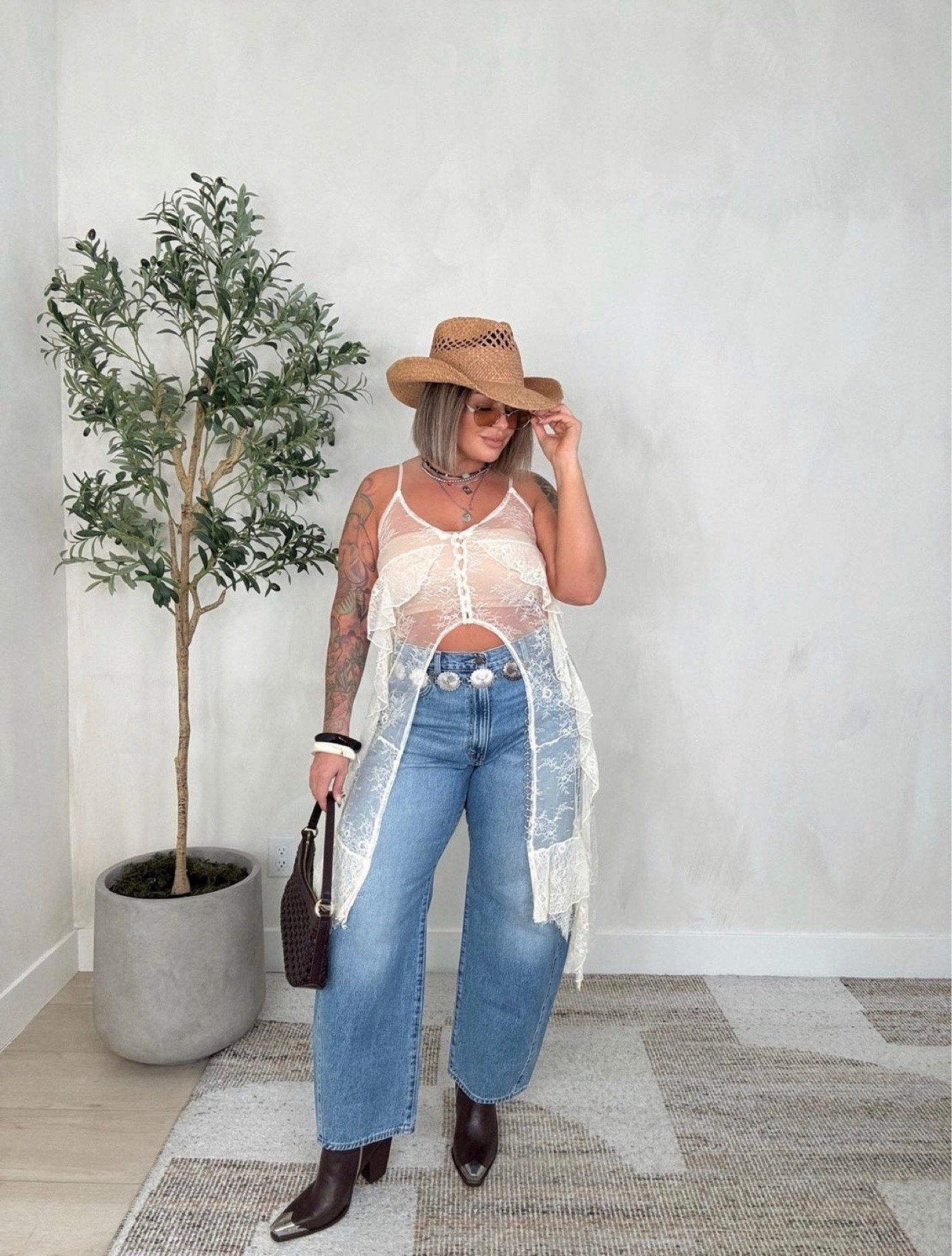 Top xl 
Bra top xl 
Jeans size up 2 sizes I’m normally a 31 I did a 33 in these the waist has a button so you can cinch it if it’s too big 
Boots size up 1/2 size

Follow my shop @shaynaslife on the @shop.LTK app to shop this post and get my exclusive app-only content!

#liketkit 
@shop.ltk
https://liketk.it/6lrlA