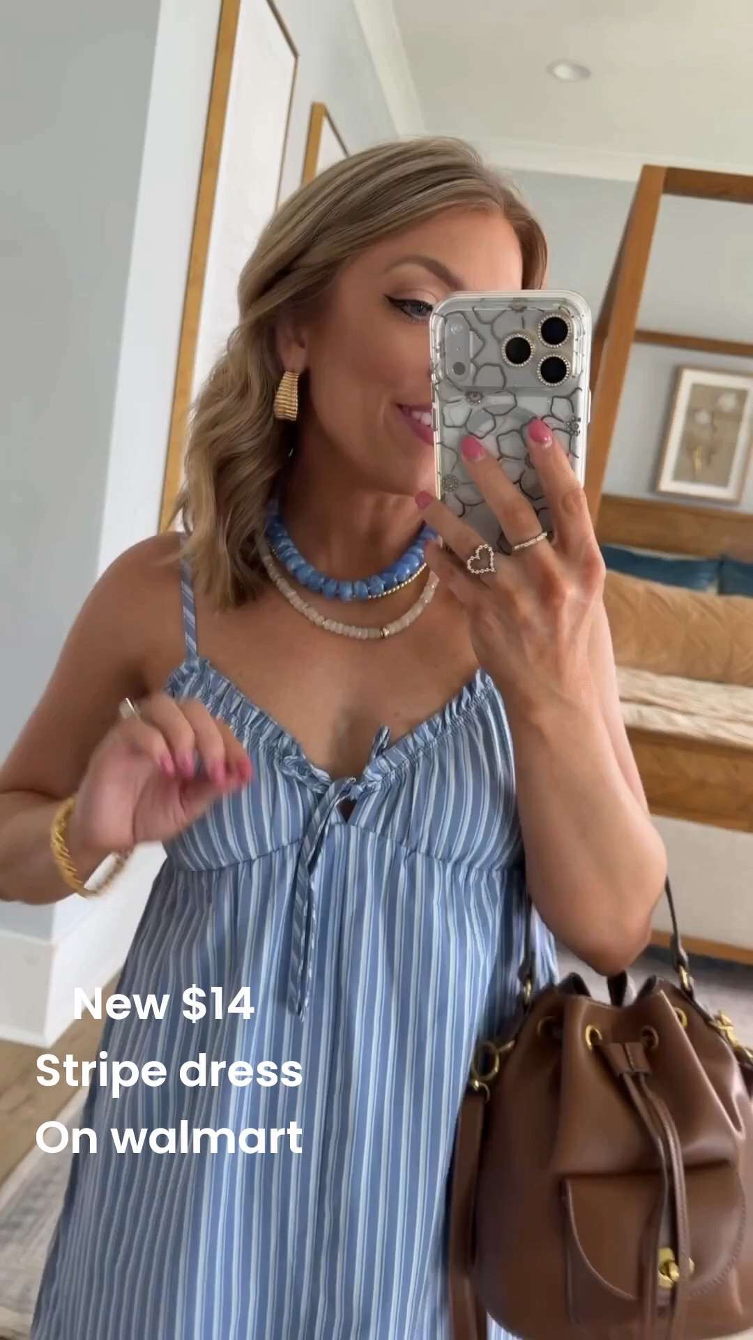 This striped Walmart dress is giving effortless summer style with a hint of coastal charm. 💙 The lightweight fabric, flattering relaxed fit, and feminine bow detail make it one of those throw-on-and-go dresses you’ll reach for over and over. I paired it with simple white sandals and a brown bucket bag for an easy everyday outfit.

Such a cute Walmart fashion find for vacations, brunch, beach trips, or warm summer days!

#walmartfashion #walmartdress #walmartnewarrivals #stripeddress #summerdress #vacationstyle #coastalstyle #casualchic #affordablefashion #ootd #momstyle #summeroutfit #fashionfinds #everydaystyle #styleinspo

#LTKootd #LTKPetite