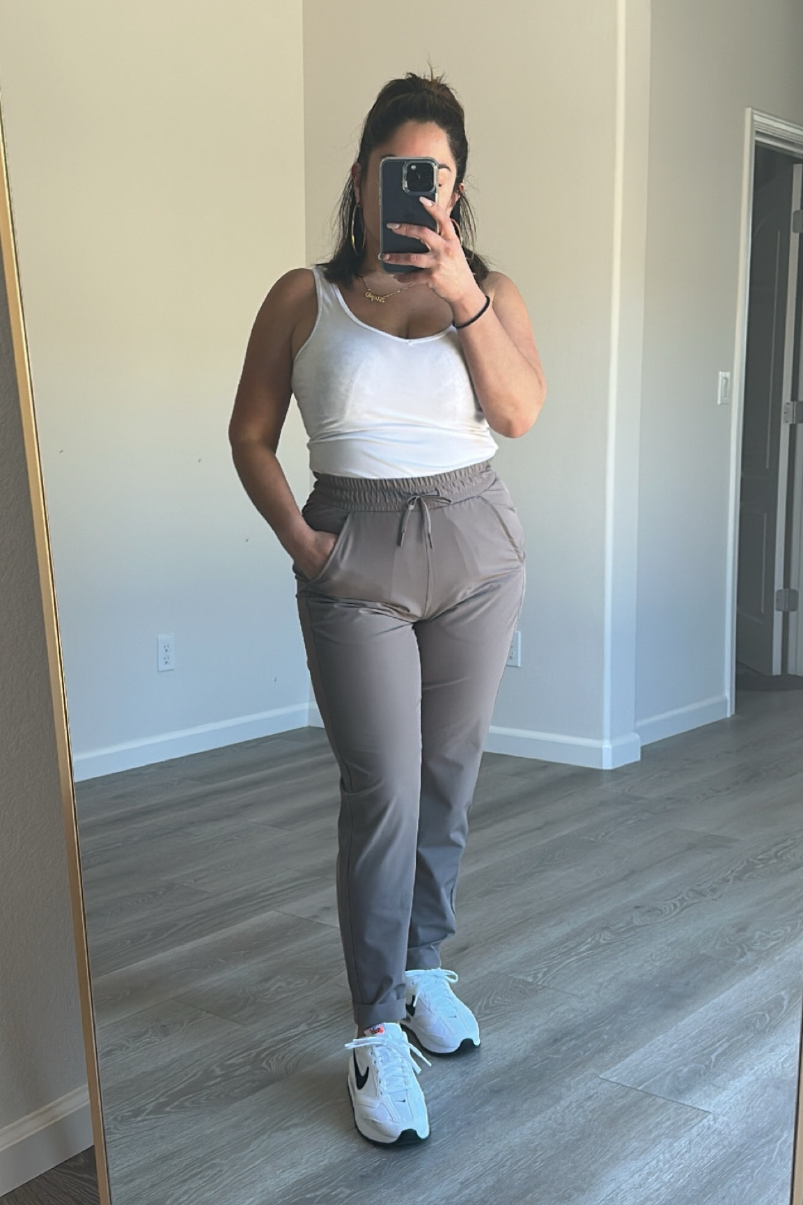 High wasted (my fave) tapered woven pants w/ that comfy jogger feel.  You can dress them up too!! These Air Max Dawns are like walking on ☁️☁️☁️
Pants: Small
Shoes: 6 

#LTKstyletip #LTKshoecrush #LTKunder50
