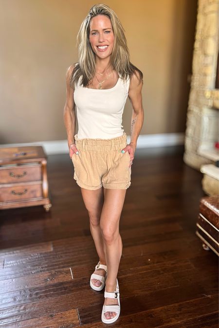 Love this simple, earthy look for summer.  This free people tank and shorts plus the sandals are the perfect summer combo!  

#LTKfindsunder100 #LTKshoecrush #LTKSeasonal