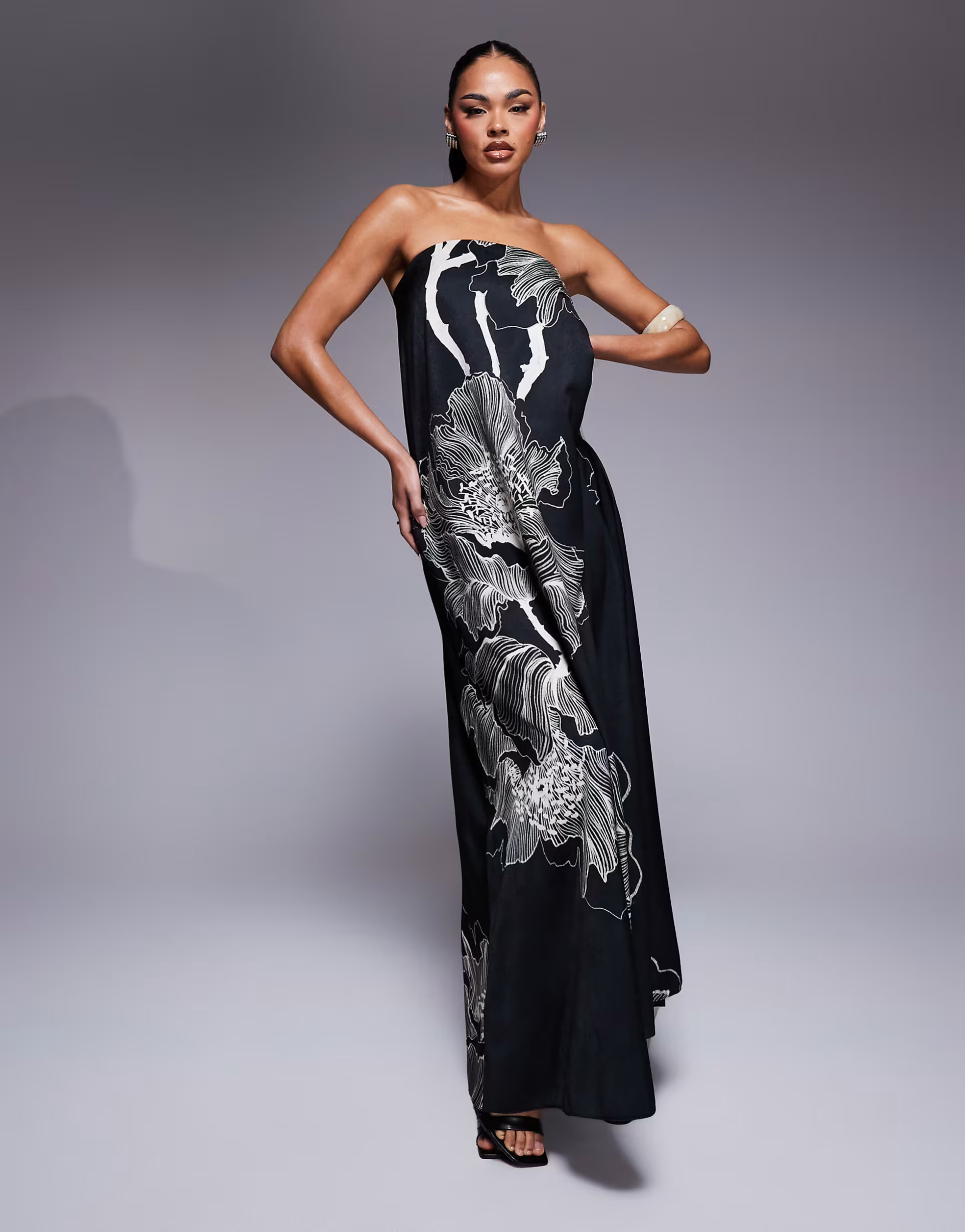ASOS DESIGN bandeau trapeze satin maxi dress in black oversized floral print | ASOS (Global)