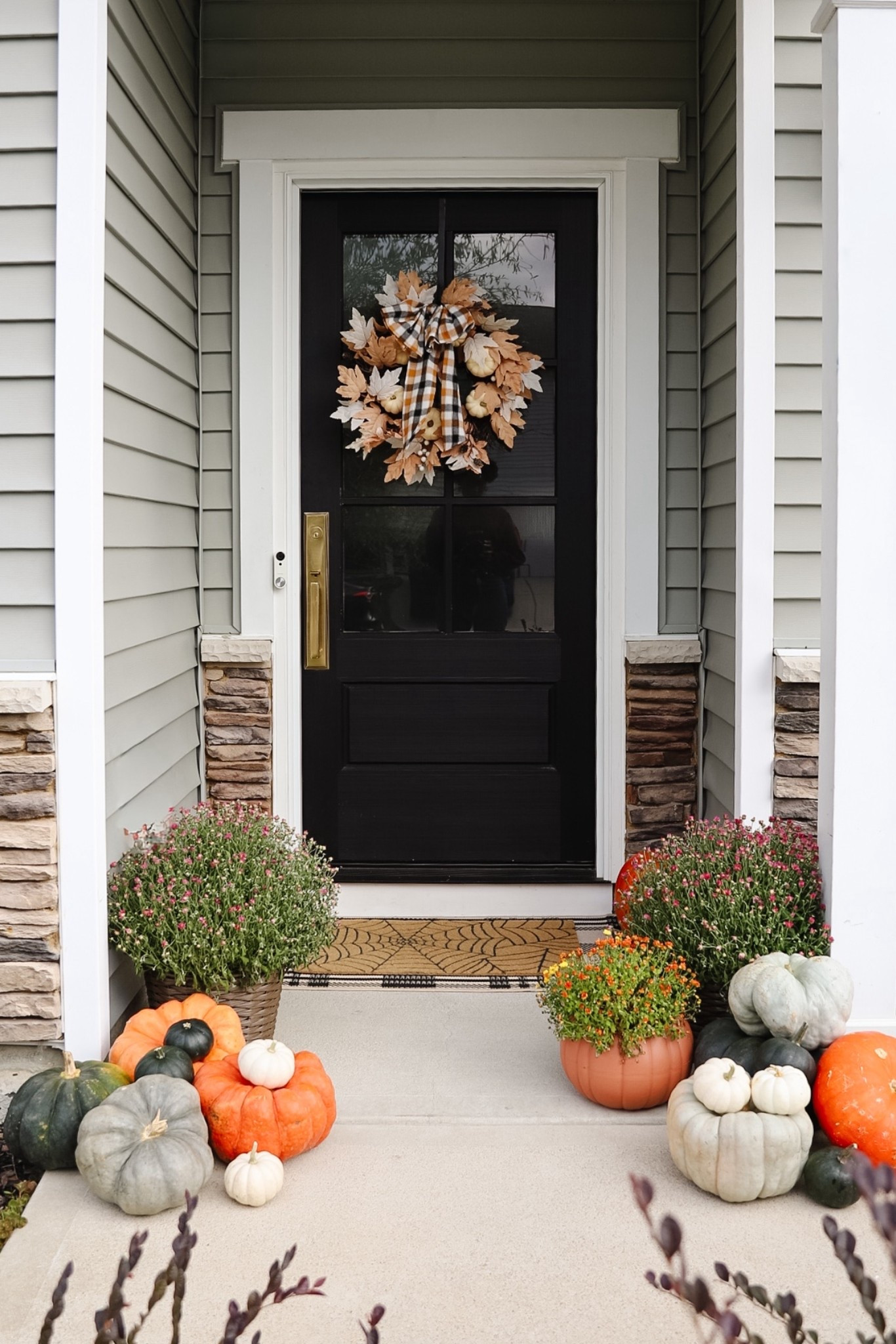 FALLOWEEN front porch, fall porch, Halloween porch. Linking this years version of my Walmart wreath.

#LTKSeasonal #LTKHome #LTKHalloween