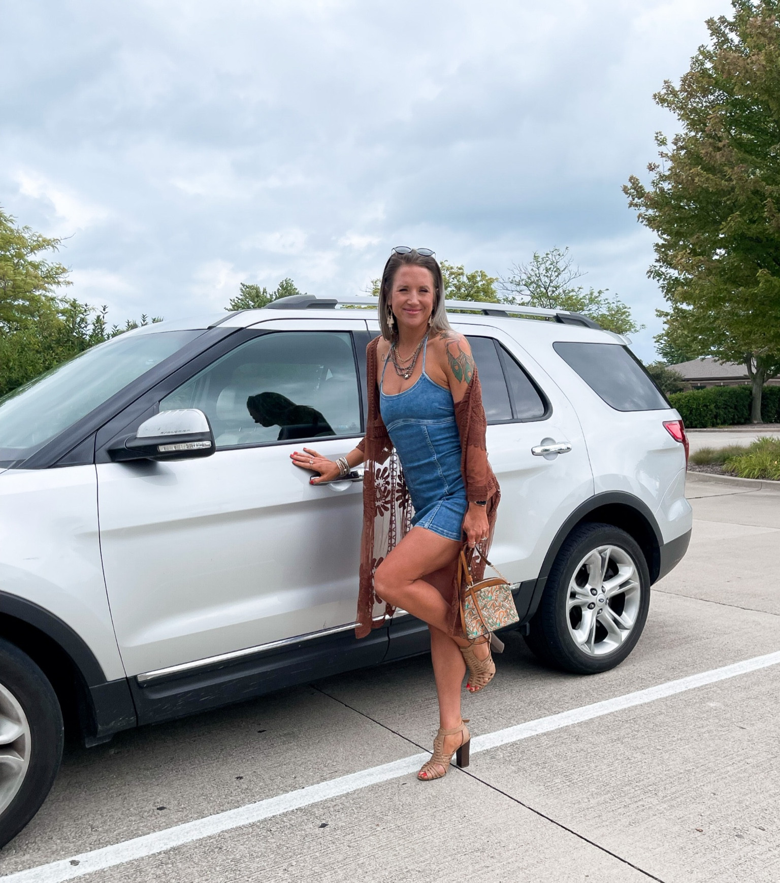 Sometimes I get “dressed up” just because I feel like it. This was one of those times 🤌🏼👅🩵 | Aerie denim dress on sale for only $34 and it’s SO. GOOD. runs tts. Wearing a small and also available in white 

#minidress #aerie #denim #boho #looksforless 

#LTKunder50 #LTKshoecrush #LTKsalealert