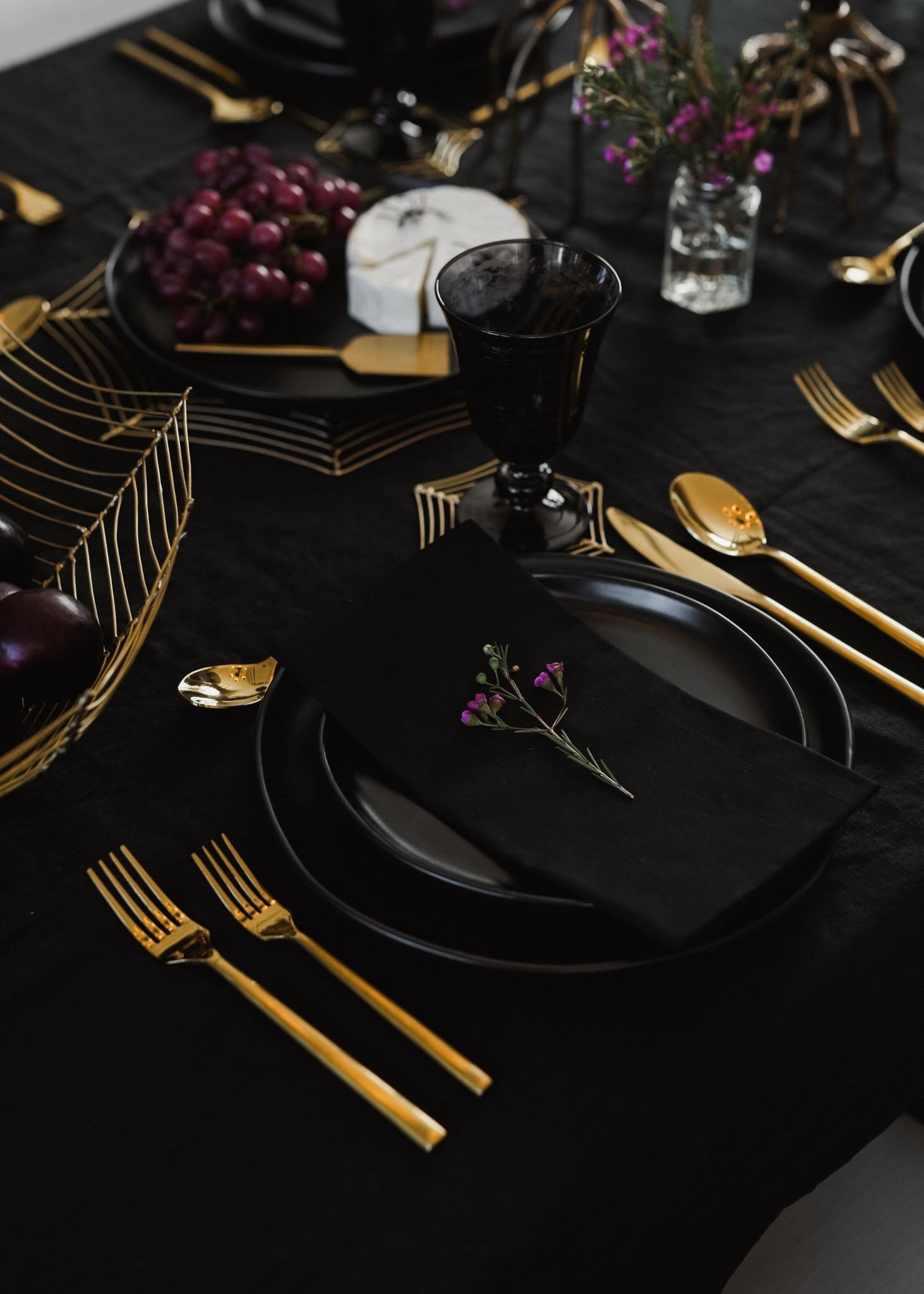 A very moody and elegant tablescape!

#LTKSeasonal #LTKmomlife #LTKHome