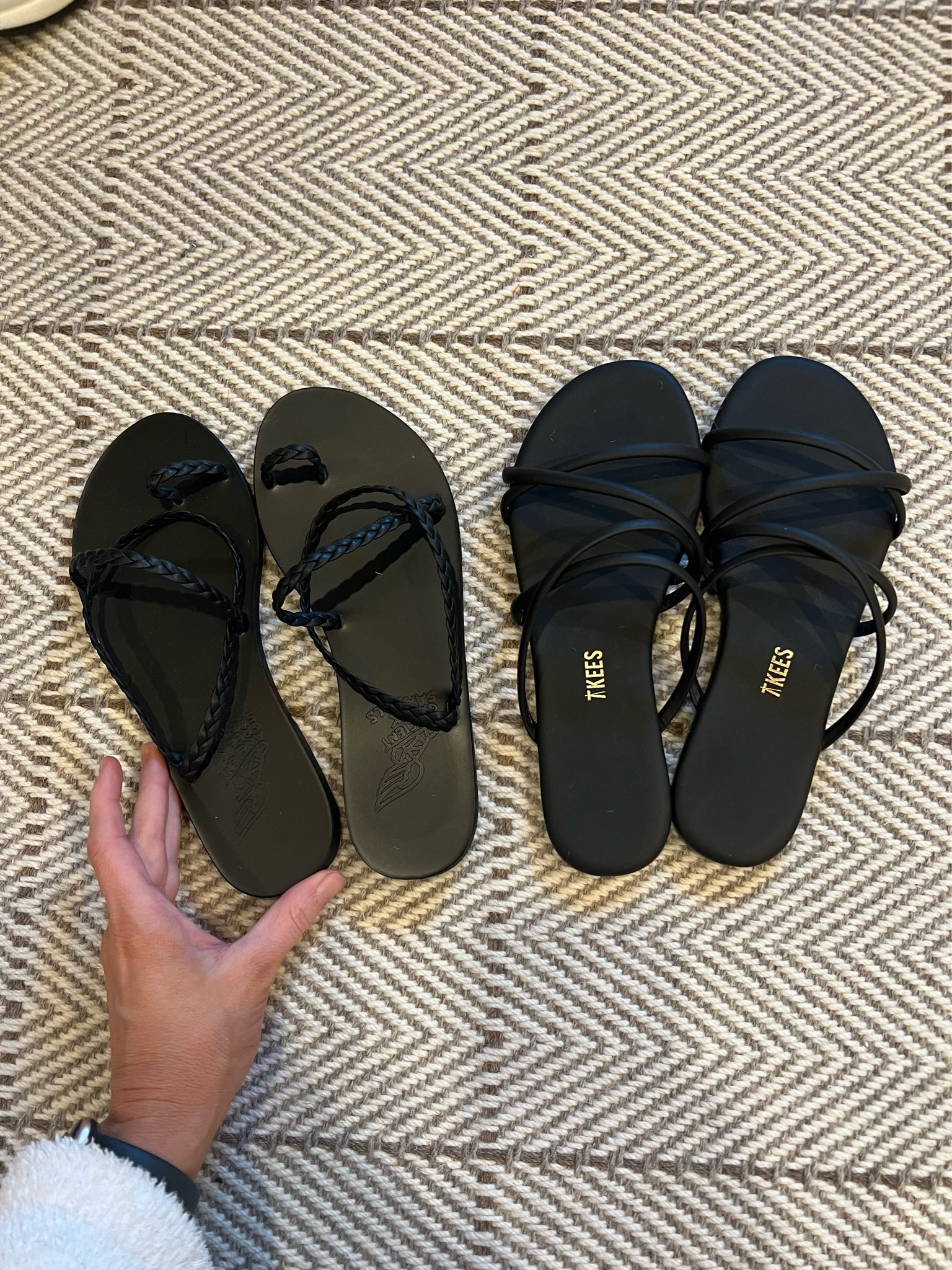 Black strappy sandals at different price points 