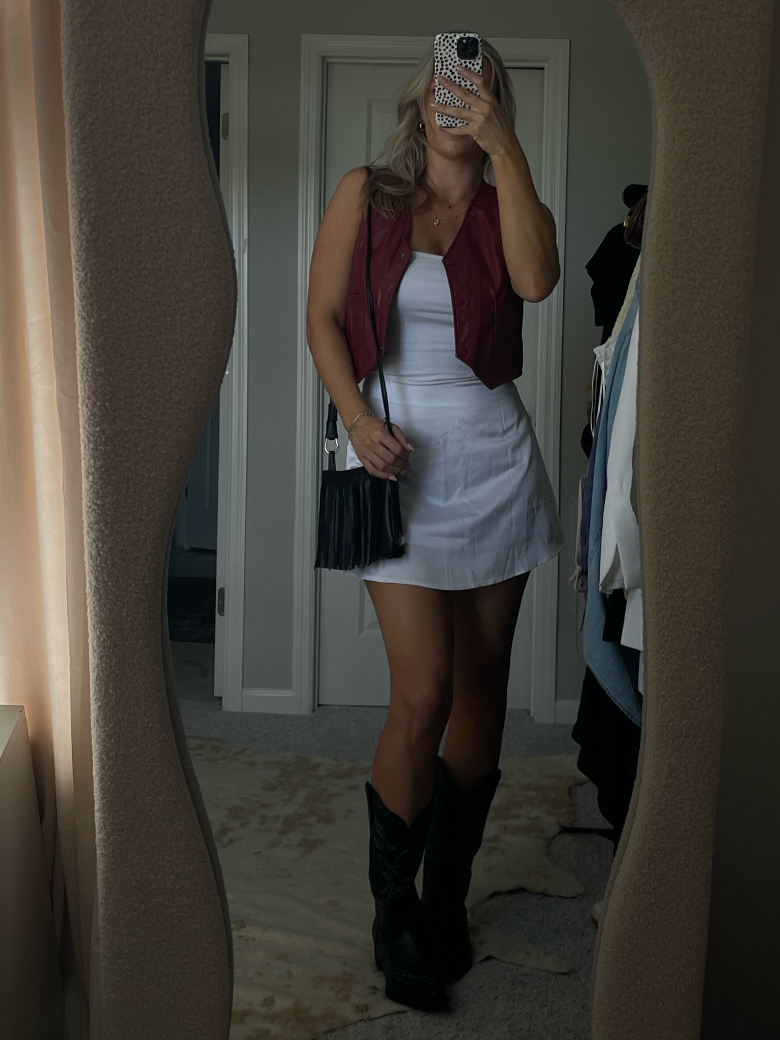 Summer country concert outfit inspo! Wearing size L in the vest, size M in the skirt (recommend sizing up if in between sizes), boots are size 10 (sized up .5), tube top is size L. #LTKConcert #CountryConcertOutfit

#LTKSeasonal