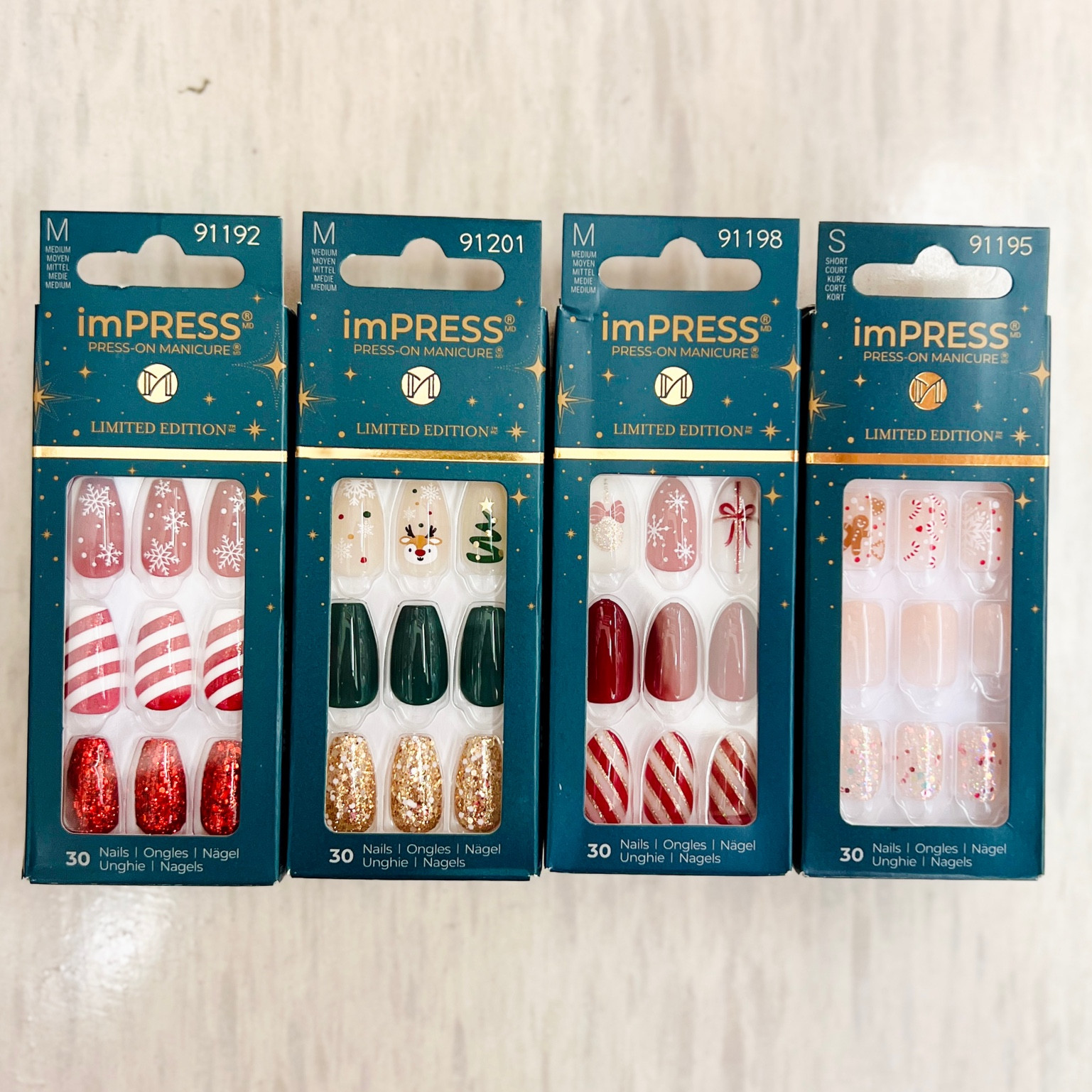 Kiss and press press on nails. Glue on nails. Christmas nails. Holiday nails. Christmas nail and spa. Candycane nails. Gingerbread nails. 

#LTKbeauty #LTKstyletip #LTKHoliday