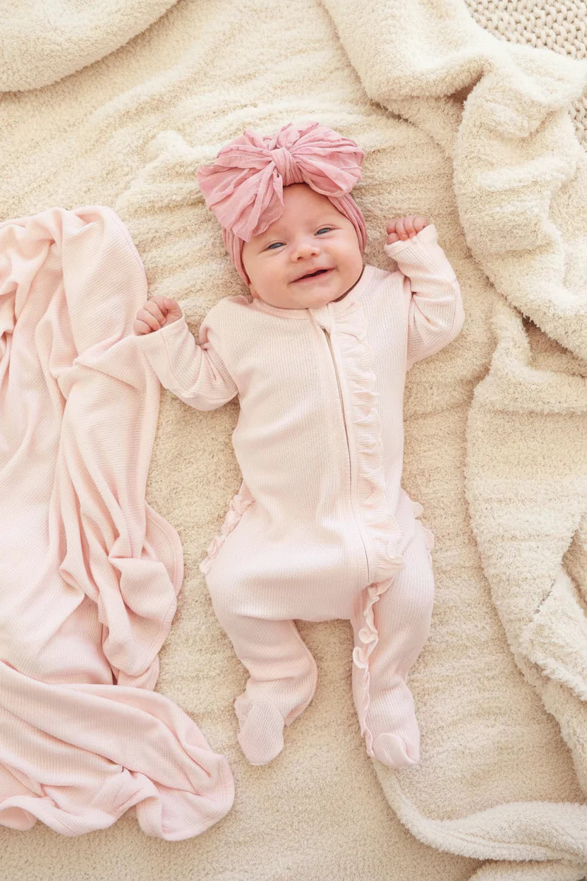 Pearl Pink Bamboo Waffle Ruffle Zipper Footie | Caden Lane