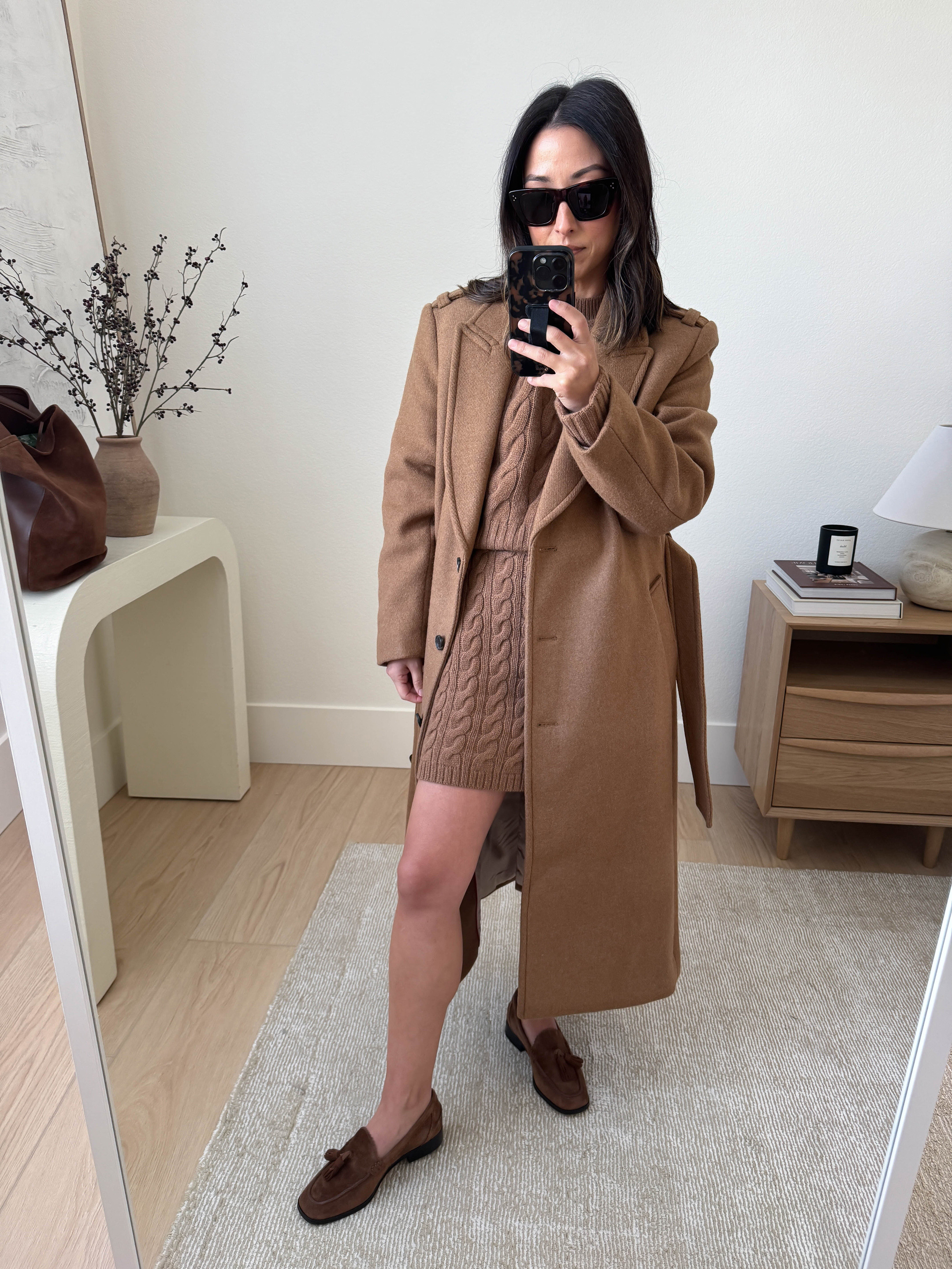 Okay, love this set SO much! Rich camel, cable knit, it's all just so perfect for this time of year. Sweater runs small and cropped. I'm in a small and I still feel like it's short. Sized up in the skirt, so it didn't feel to snug and like I'm going to the club. Super comfy and perfect for Thanksgiving!

Coat is also one of my favorite finds for fall. The fit is amazing and I find the shoulder pads to be really elevated. 

J.Crew Coat xs
J.Crew sweater small
J.Crew skirt small
J.Crew loafers 5
J.Crew bucket bag
Celine sunglasses

#LTKHoliday #LTKSeasonal