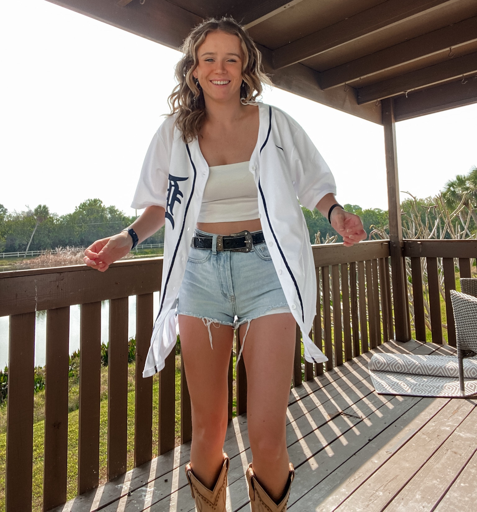 Headed out to Lakeland a few weeks back to catch a Tigers spring training game and had to sport a jersey. Paired it with a basic tank from Zara that had a little shiny texture to it for some contrast and then threw on some blue Jean shorts and boots. Boots can’t be linked so they are idyllwind ! Linked a few ideas for tops below 

#LTKunder50 #LTKfit #LTKSeasonal