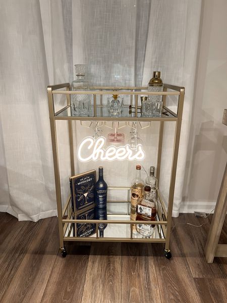 Bar cart. Amazon home finds. Amazon home decor. Gifts for her. Gold bar cart. Shot glasses. Martini glasses. Wine glasses 

#LTKhome #LTKfindsunder100 #LTKsalealert