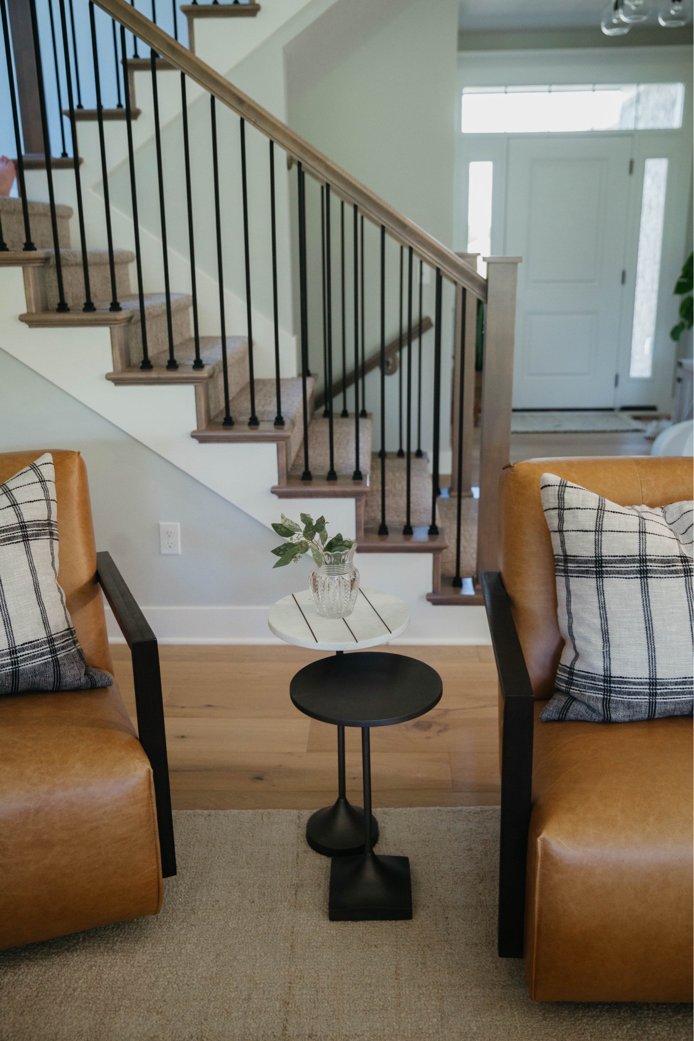 Airy living room design for a calm cool collected, modern, livable luxury feel with a white sofa, leather side, chairs, Empire, shade floor lamp, large, easy, plant tree, and lots of texture. Living room refresh & virtual design 

#LTKHome #LTKSummerSales