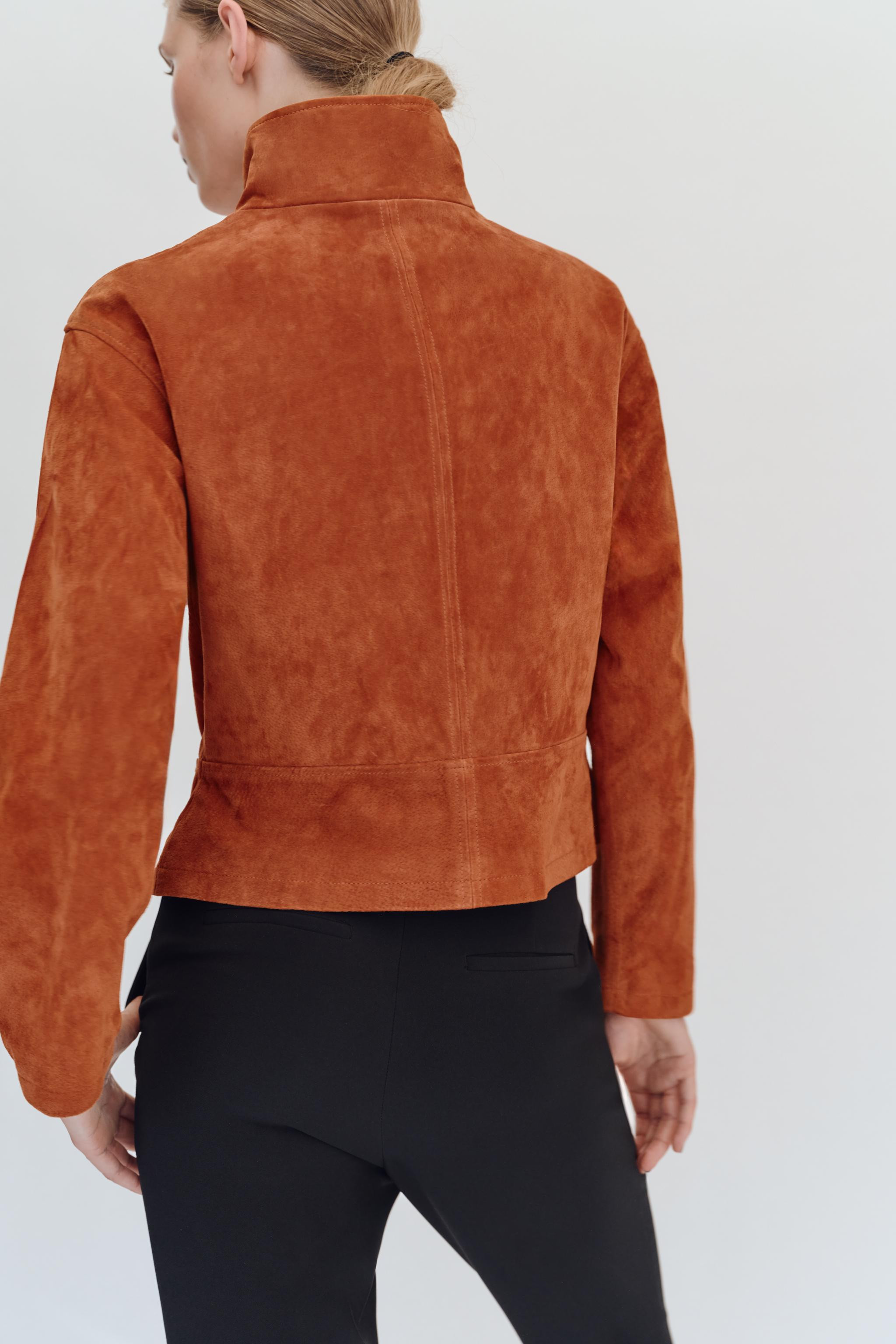 Jacket crafted from 100% premium leather. Features a stand collar, long sleeves, and front pocket... | Zara Canada
