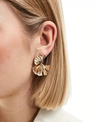 ASOS DESIGN drop earrings with textured leaf design in gold tone | ASOS (Global)