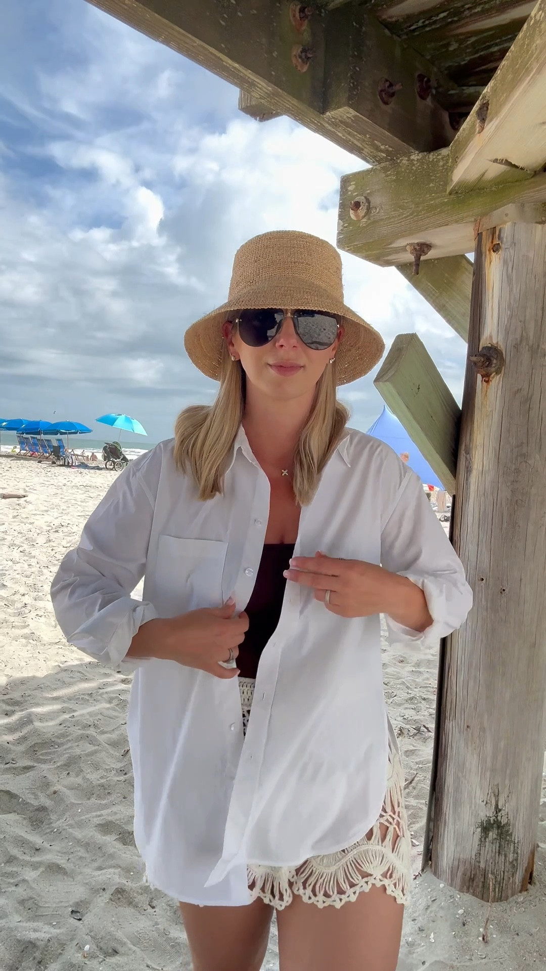 Spring Break at the beach wearing my fave wrinkle resistant shirt that is perfect as a coverup when you get too much sun! Size down, wearing an XS! Currently 20% OFF! 

Spring break, summer outfits, summer fashion, swimsuit coverup 

#LTKootd #LTKSaleAlert #LTKSwim