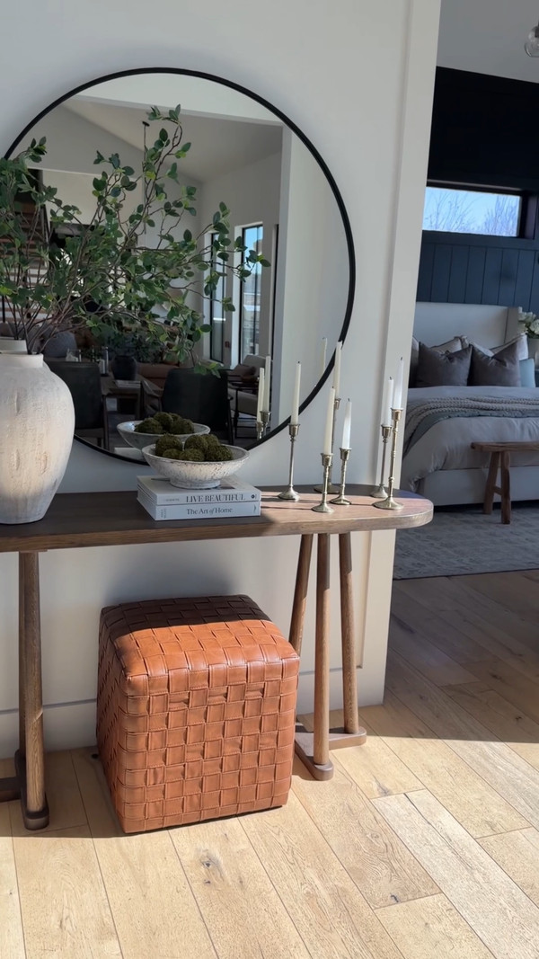 Our entryway into our bedroom is all about soft layers, warm wood tones, and…