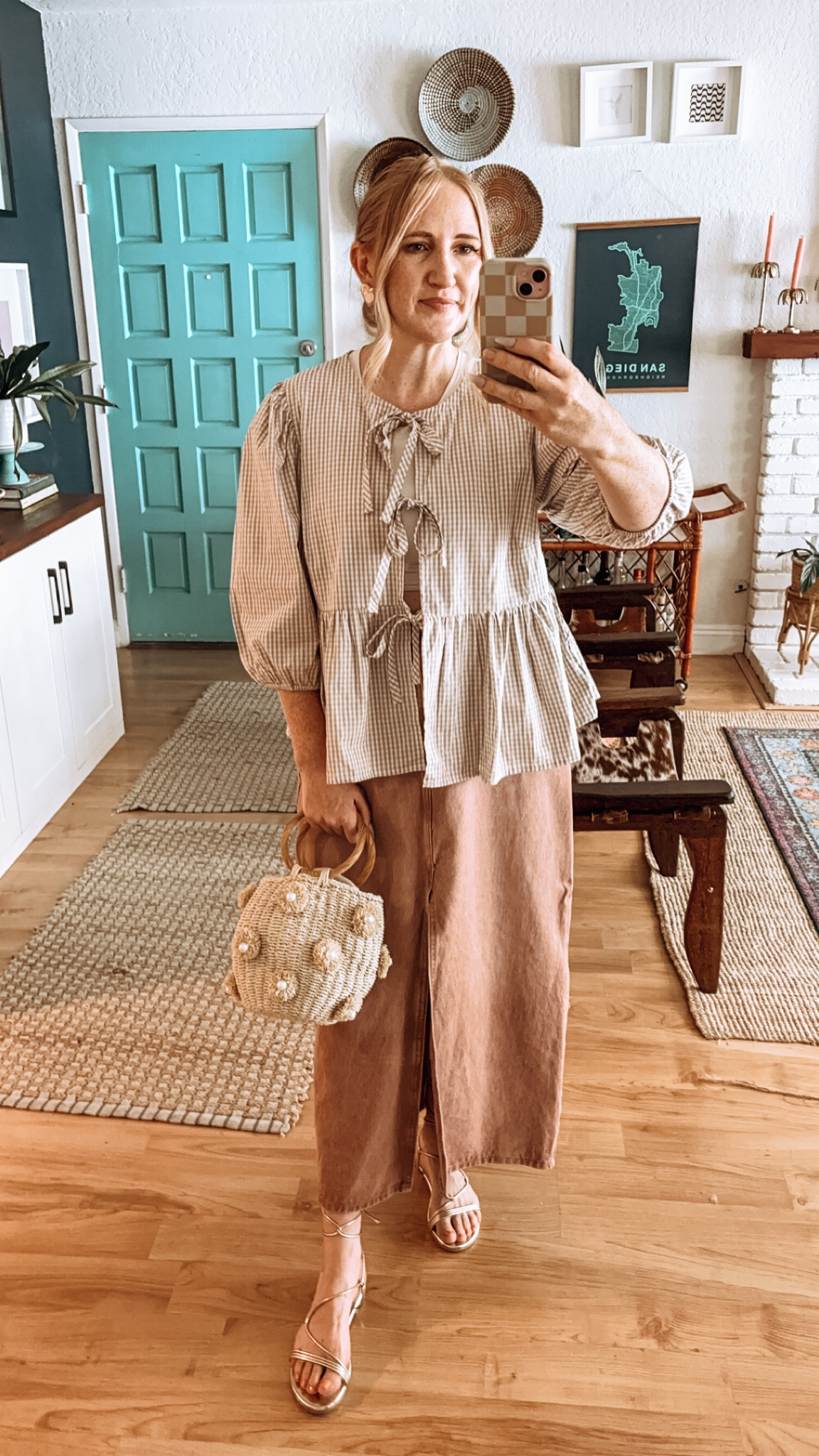 Church fit 🧡 love this gingham tie top so much I bought in another color! Fit is TTS, wearing L for a looser fit but M would have worked too. Skirt is TTS. 

Gingham top, tie front top, y2k style, denim maxi skirt, denim skirt, straw tote, summer outfit, fall transitional outfit, church style, church look, dressy casual, lace tie sandals, gold sandals, summer sandals

#LTKStyleTip #LTKFindsUnder50 #LTKFindsUnder100